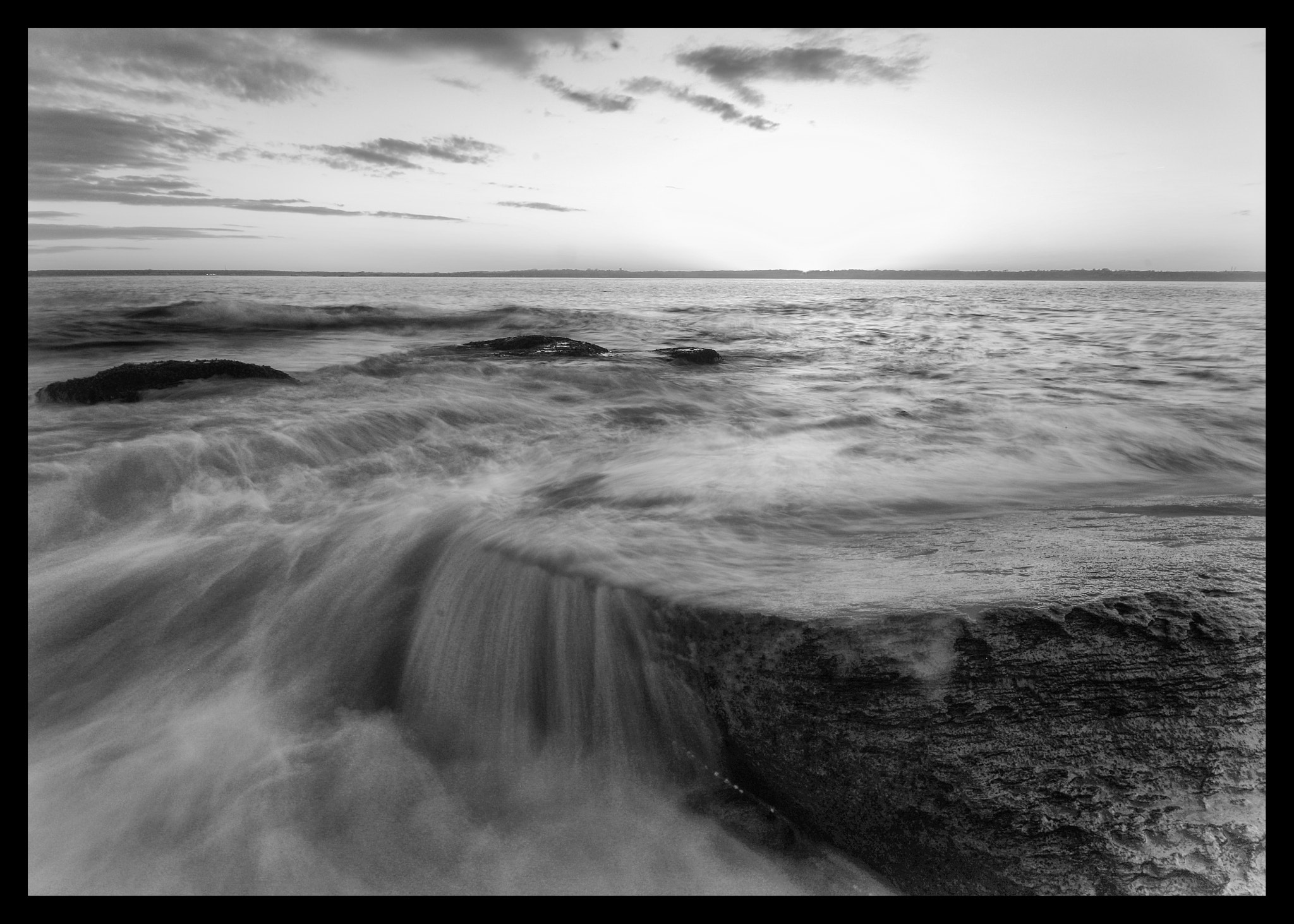 Sigma AF 10-20mm F4-5.6 EX DC sample photo. Black and white water on rocks photography