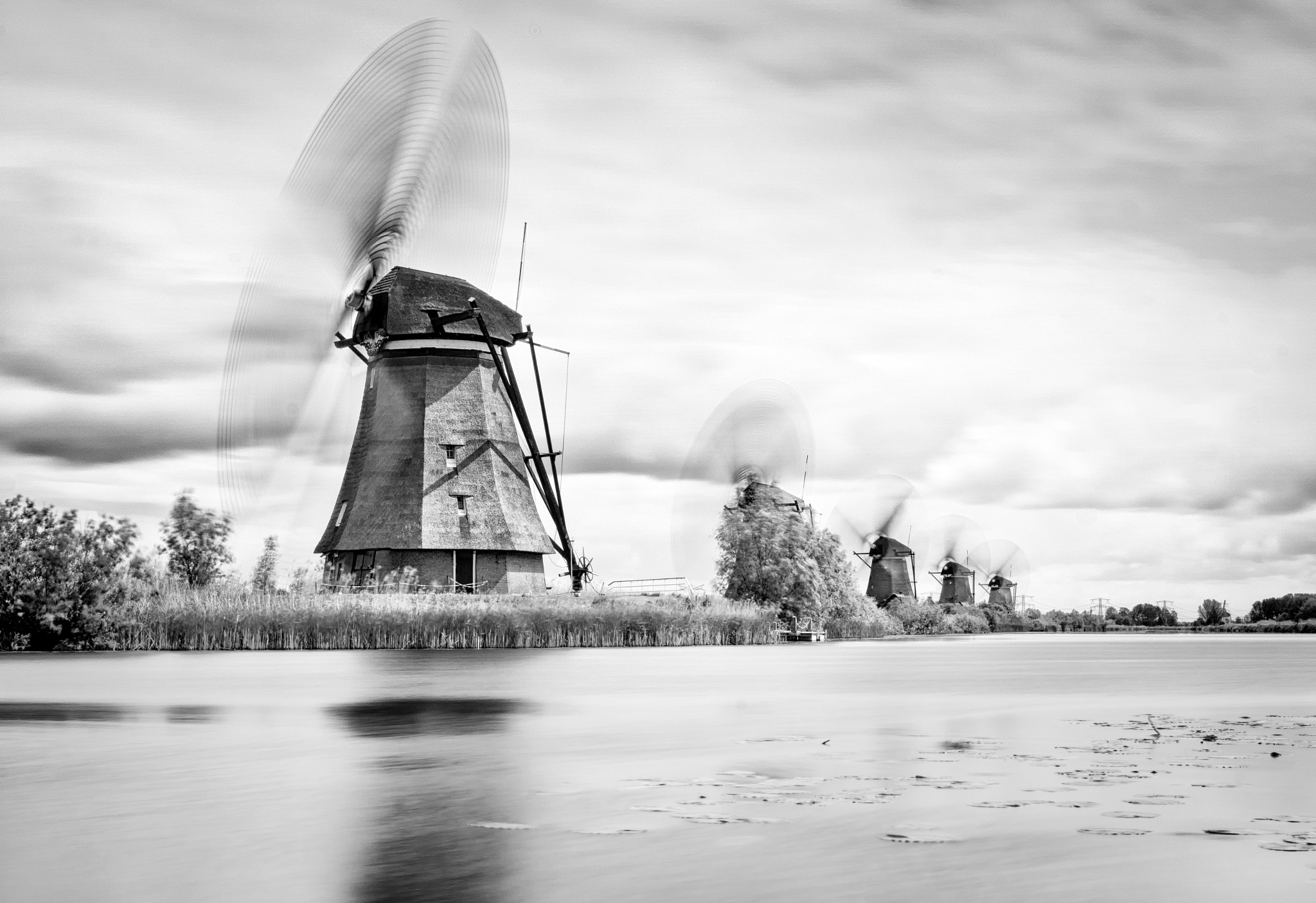 Sony ILCA-77M2 + Tamron SP 24-70mm F2.8 Di VC USD sample photo. Windmills at work photography