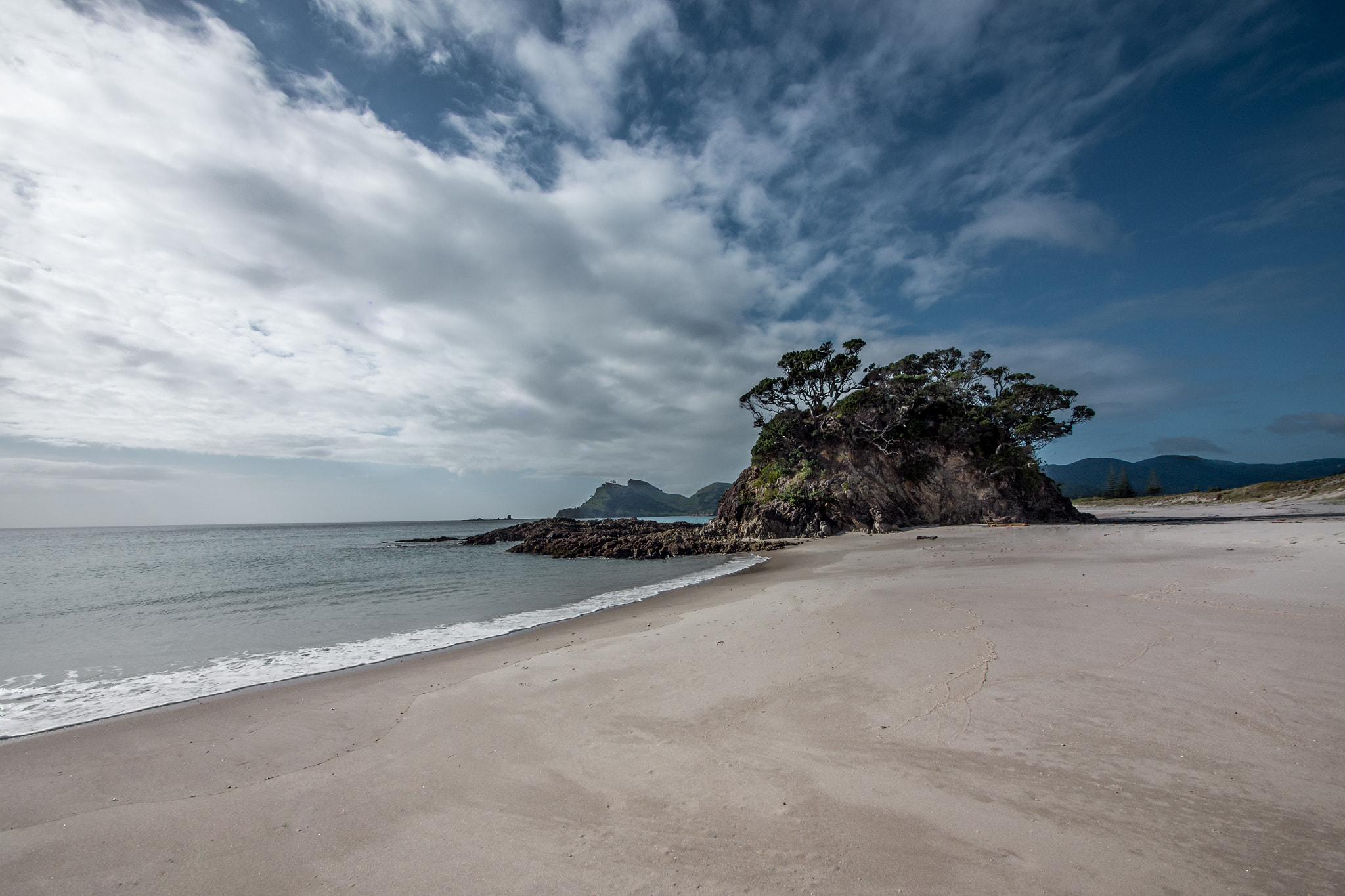 Olympus OM-D E-M5 + Panasonic Lumix G Vario 7-14mm F4 ASPH sample photo. Memory rock, oruawharo bay, great barrier island photography