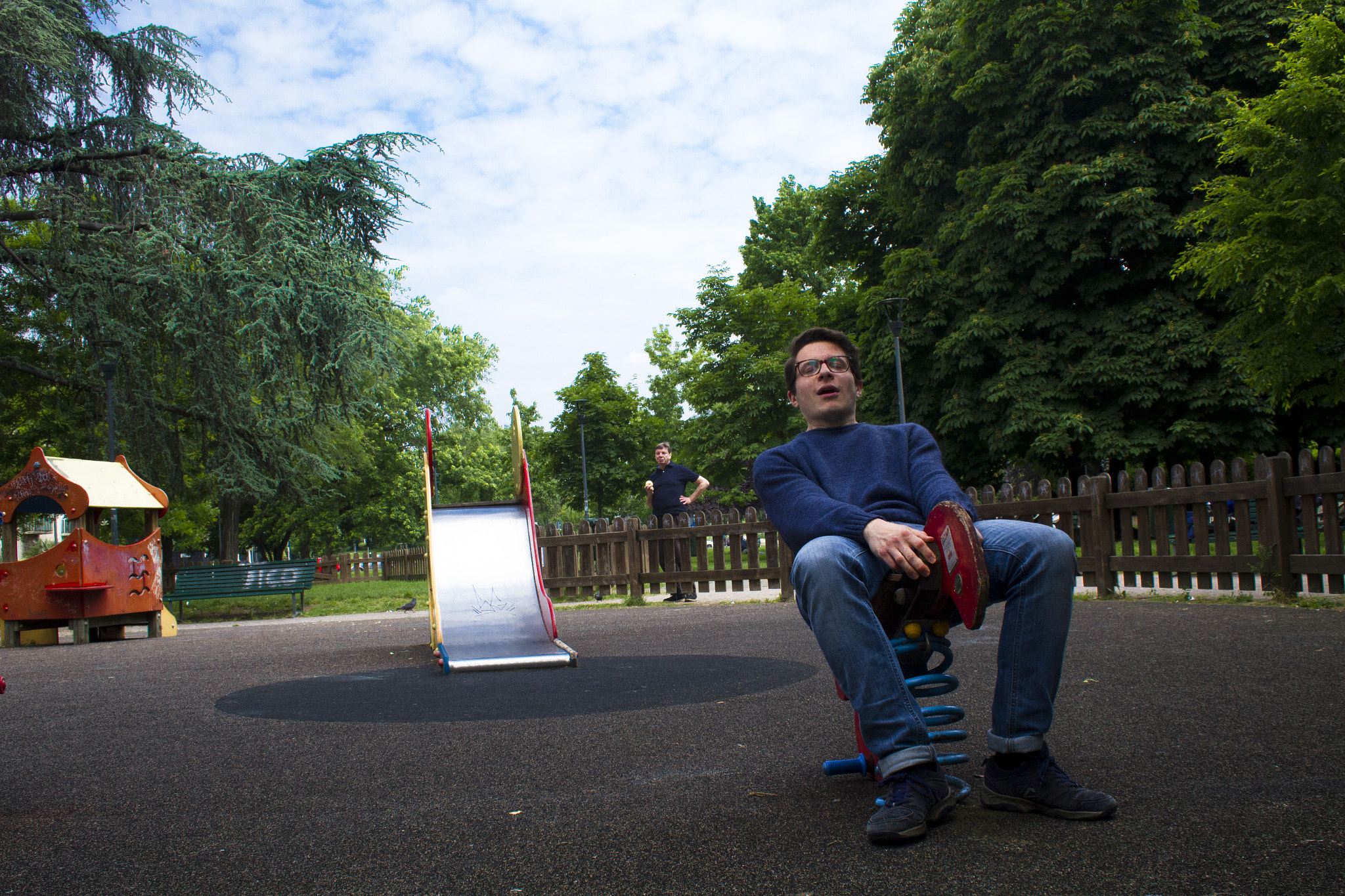 Canon EF-S 18-55mm F3.5-5.6 sample photo. Man with apple behind you. photography