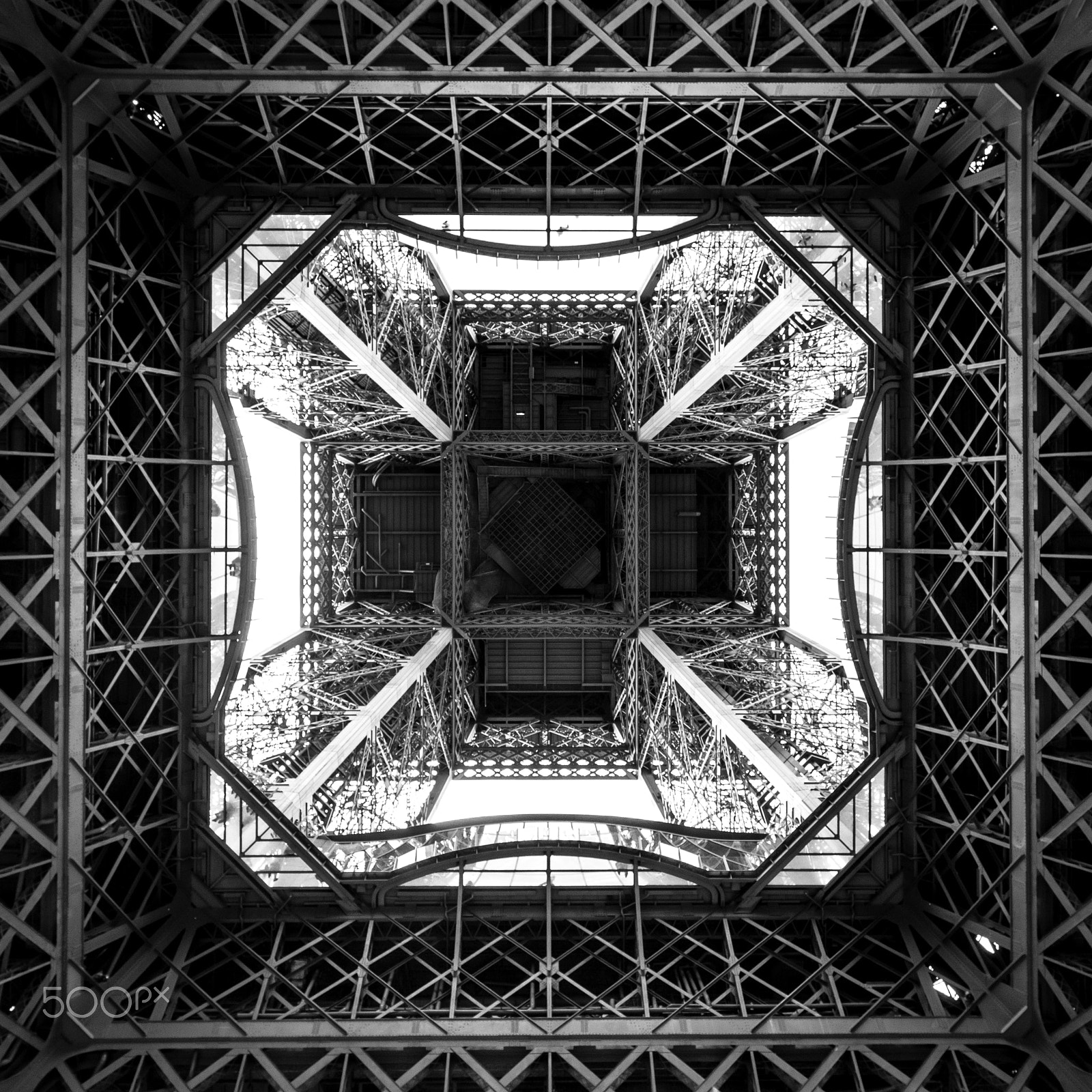 Canon EOS 600D (Rebel EOS T3i / EOS Kiss X5) + Canon EF 16-35mm F4L IS USM sample photo. Eiffel tower from below photography