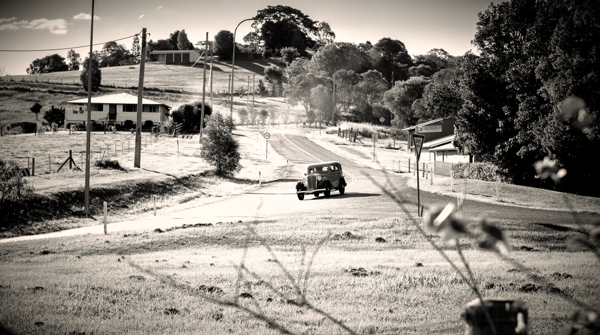 Sigma 50mm F1.4 EX DG HSM sample photo. Old car on the run photography