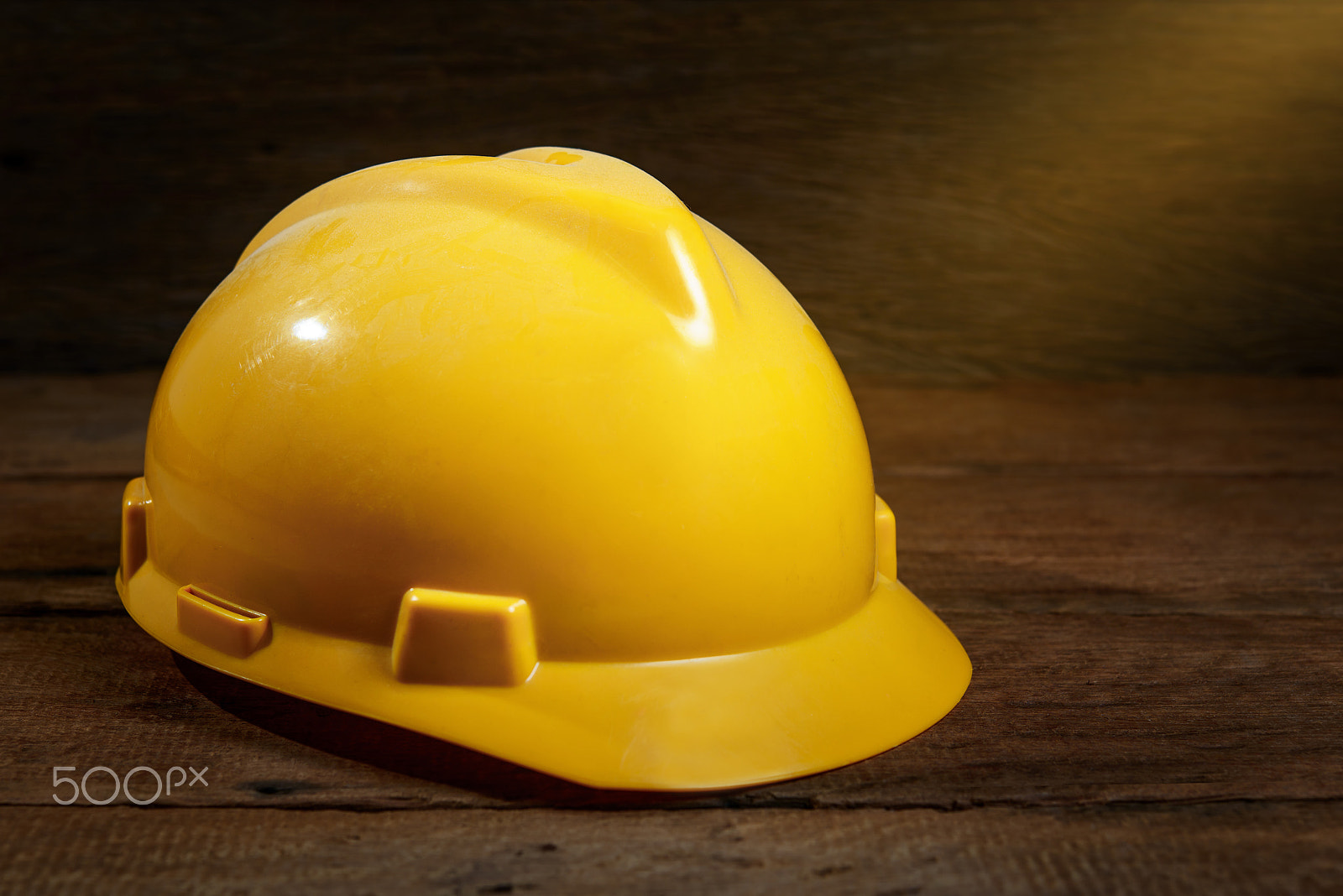 Nikon AF-S Micro-Nikkor 60mm F2.8G ED sample photo. Dirty yellow safety helmet or hard hat on wood background photography