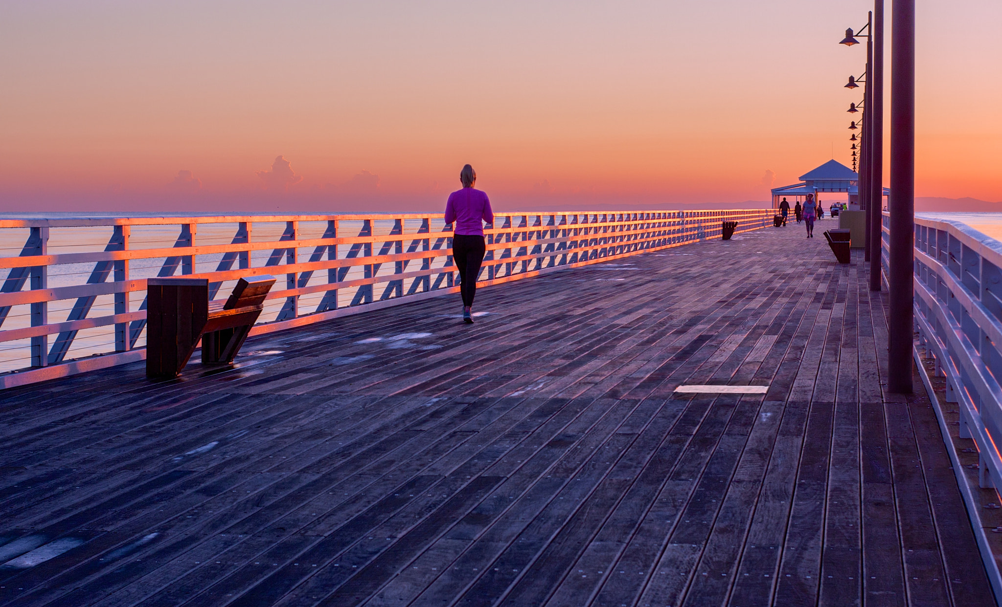 Sigma 50mm F1.4 EX DG HSM sample photo. Exercising along the pier photography