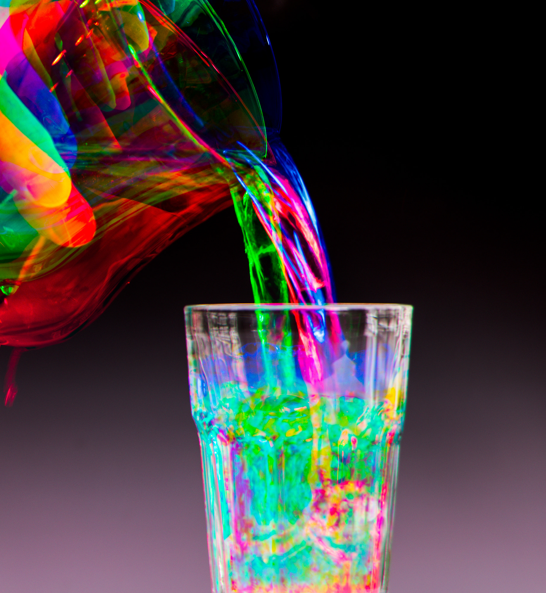 AF Zoom-Nikkor 28-105mm f/3.5-4.5D IF sample photo. Pouring water - harris shutter effect photography