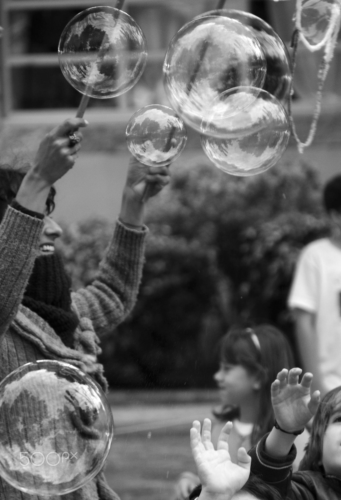 Nikon D3100 + Sigma 18-200mm F3.5-6.3 II DC OS HSM sample photo. Bubbles and hands photography