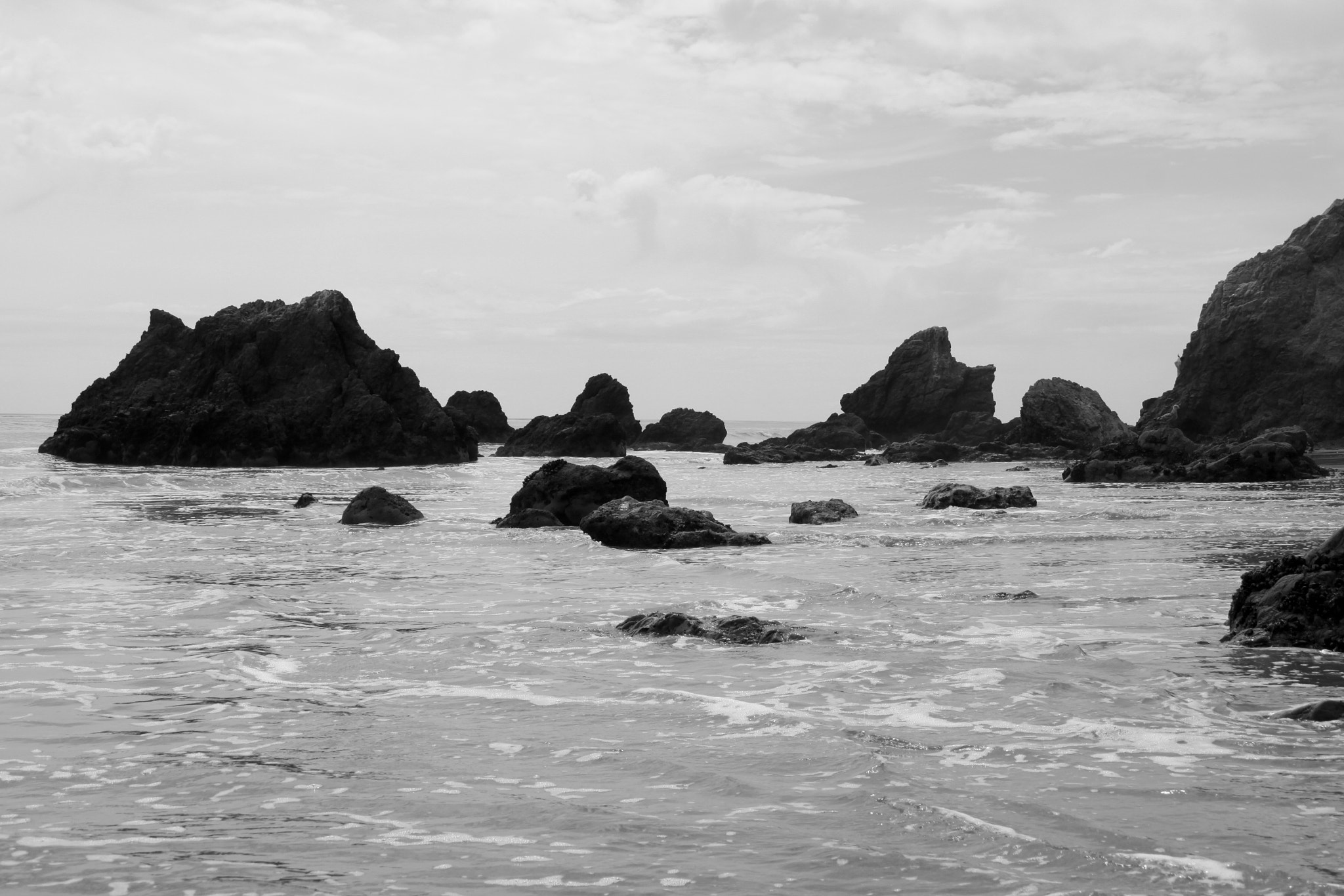 Canon EF-S 18-55mm f/3.5-5.6 USM sample photo. Rocks in the water photography