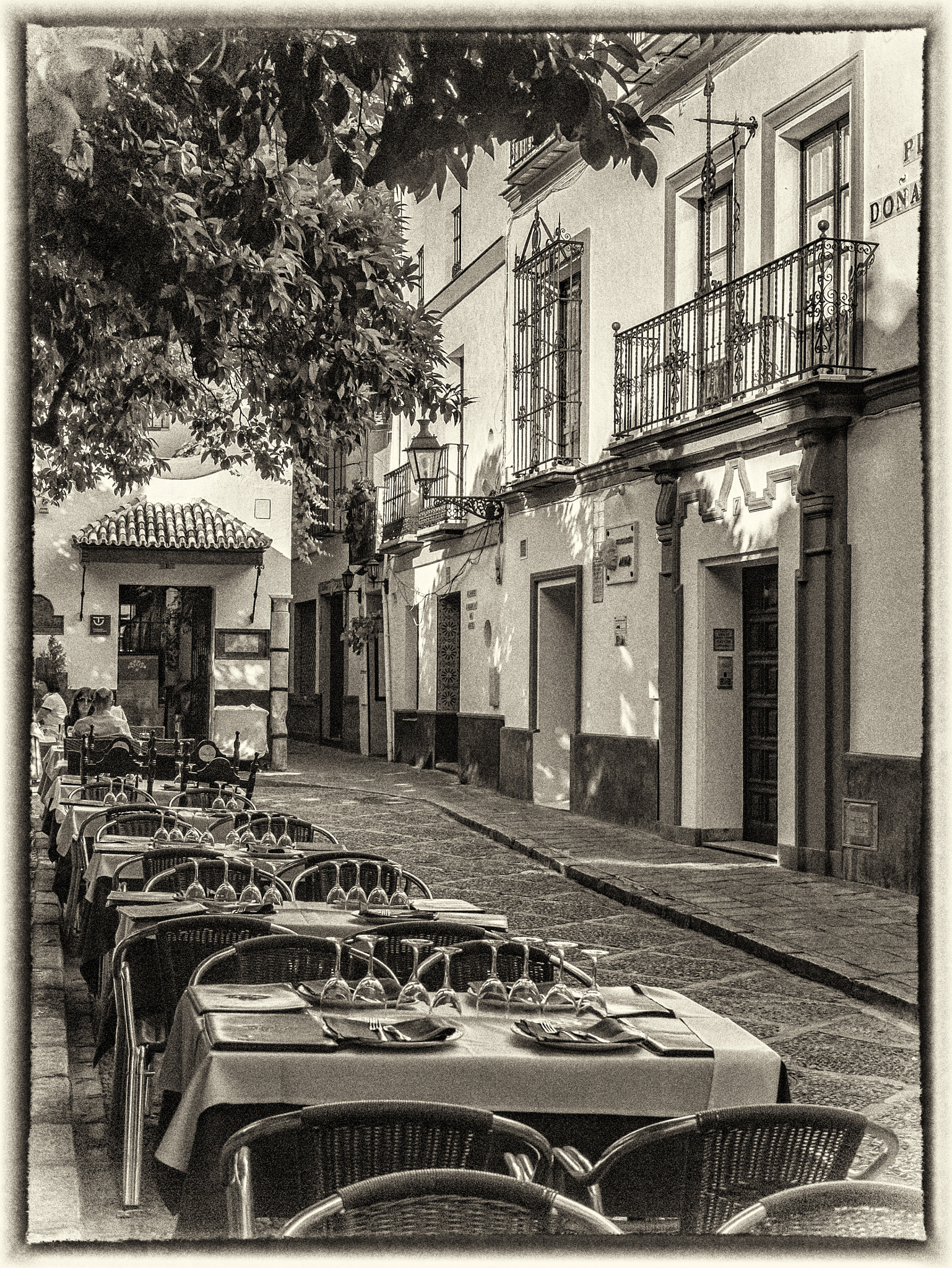 Panasonic Lumix DMC-GX1 sample photo. Seville sidewalk photography