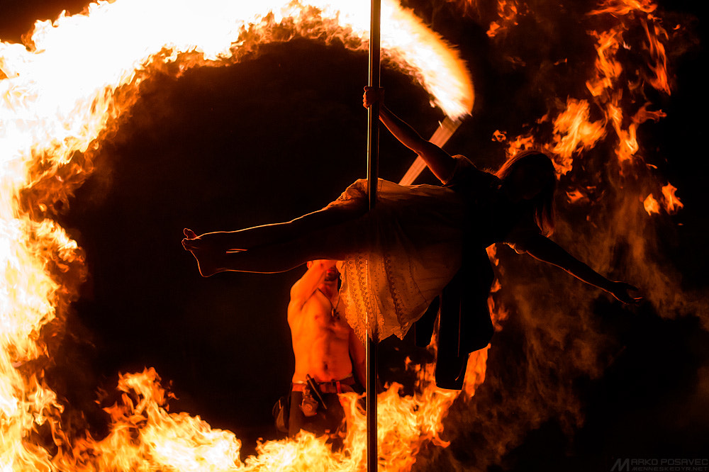 Olympus E-5 + OLYMPUS 50mm Lens sample photo. Fiery pole dance photography