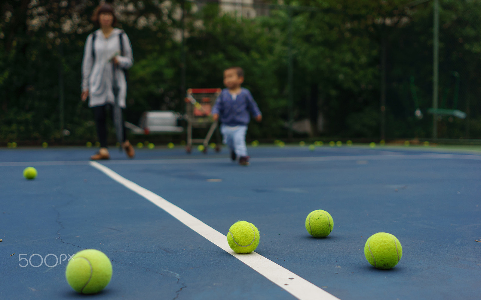 Sony Alpha NEX-5N + Minolta AF 28mm F2 sample photo. Playing tennis photography