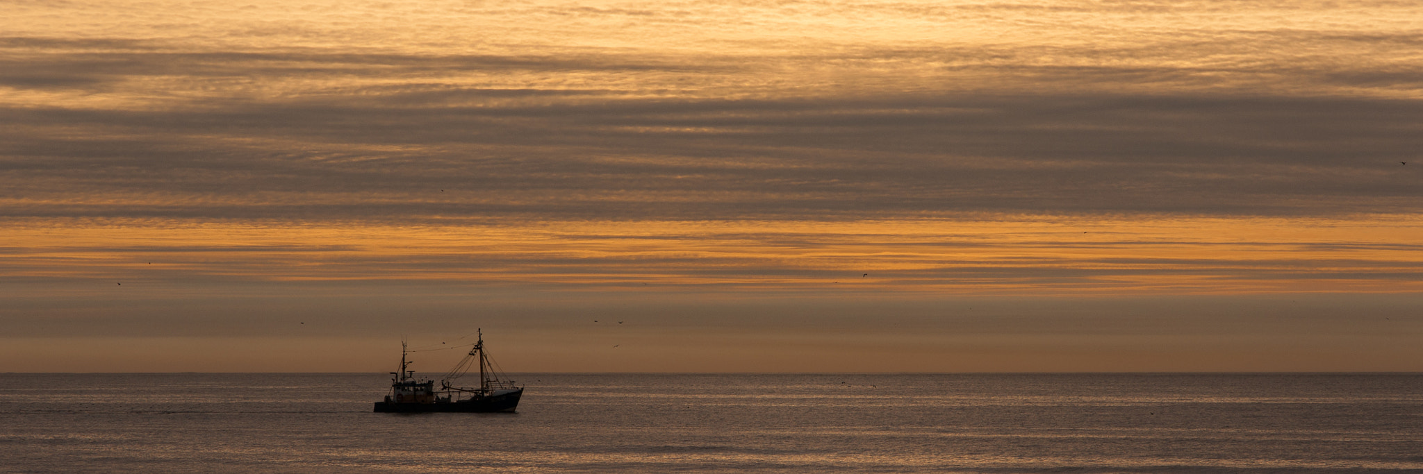 Sony Alpha DSLR-A700 + Sigma 17-70mm F2.8-4.5 (D) sample photo. Fishingboat at sea photography