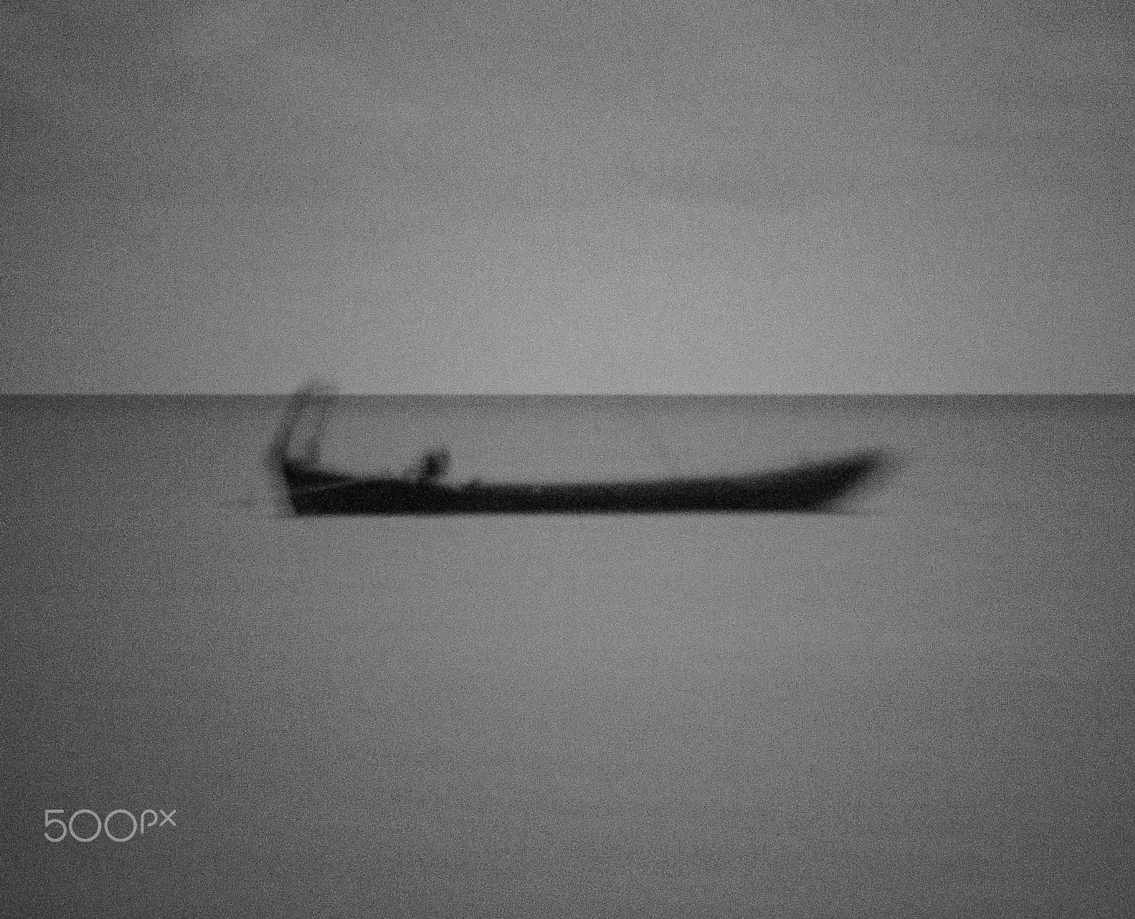 Panasonic Lumix G Vario 45-200mm F4-5.6 OIS sample photo. Lost boat photography
