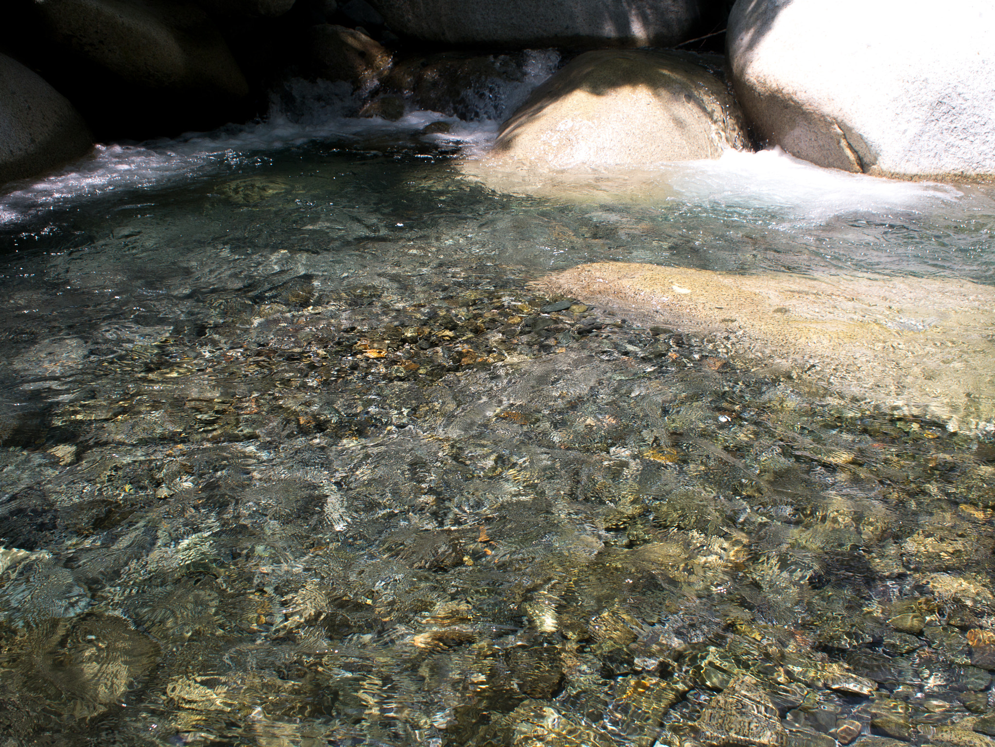 Panasonic Lumix DMC-GX1 + Olympus M.Zuiko Digital 17mm F2.8 Pancake sample photo. Water sun and stone photography