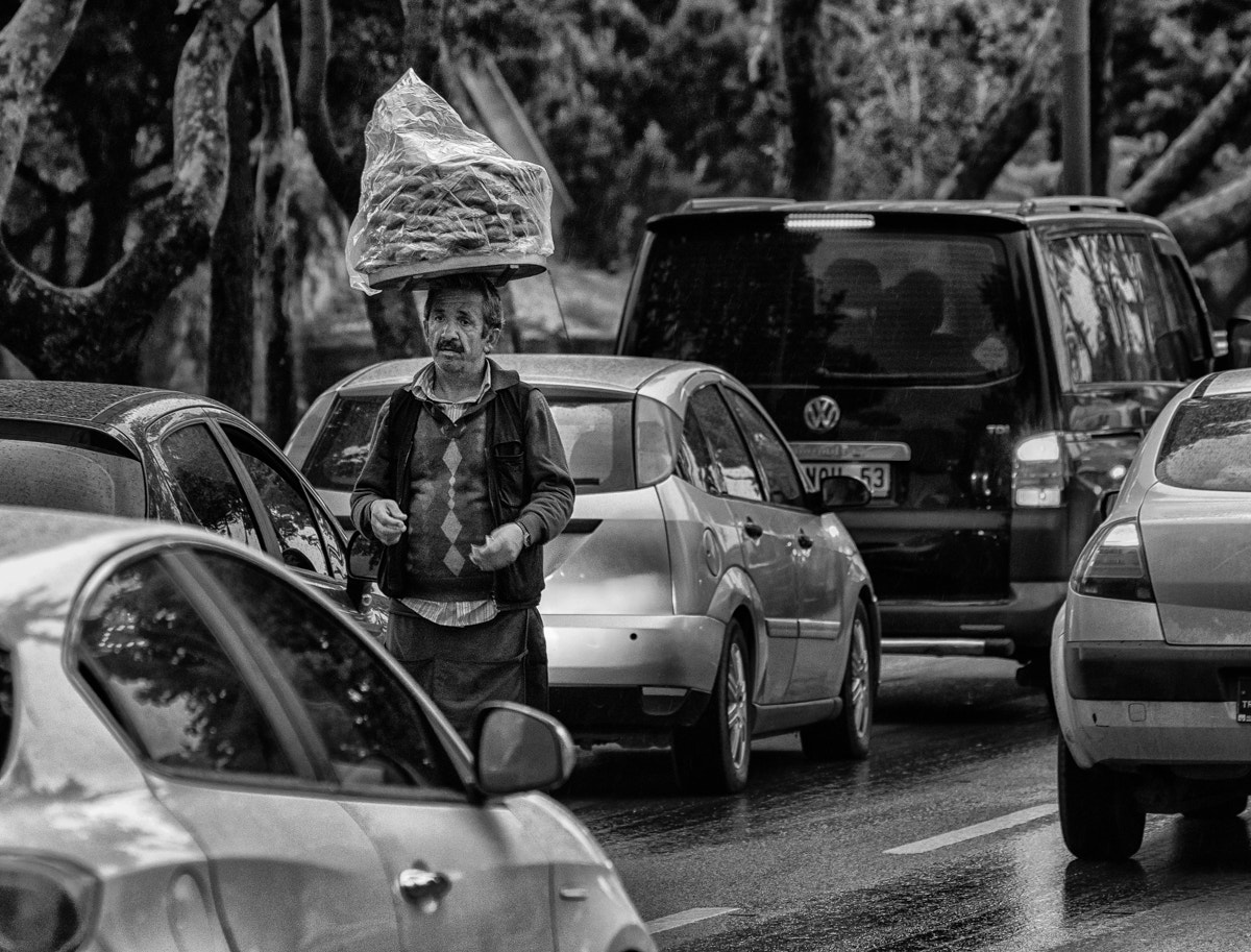 Sony 75-300mm F4.5-5.6 sample photo. Street seller photography