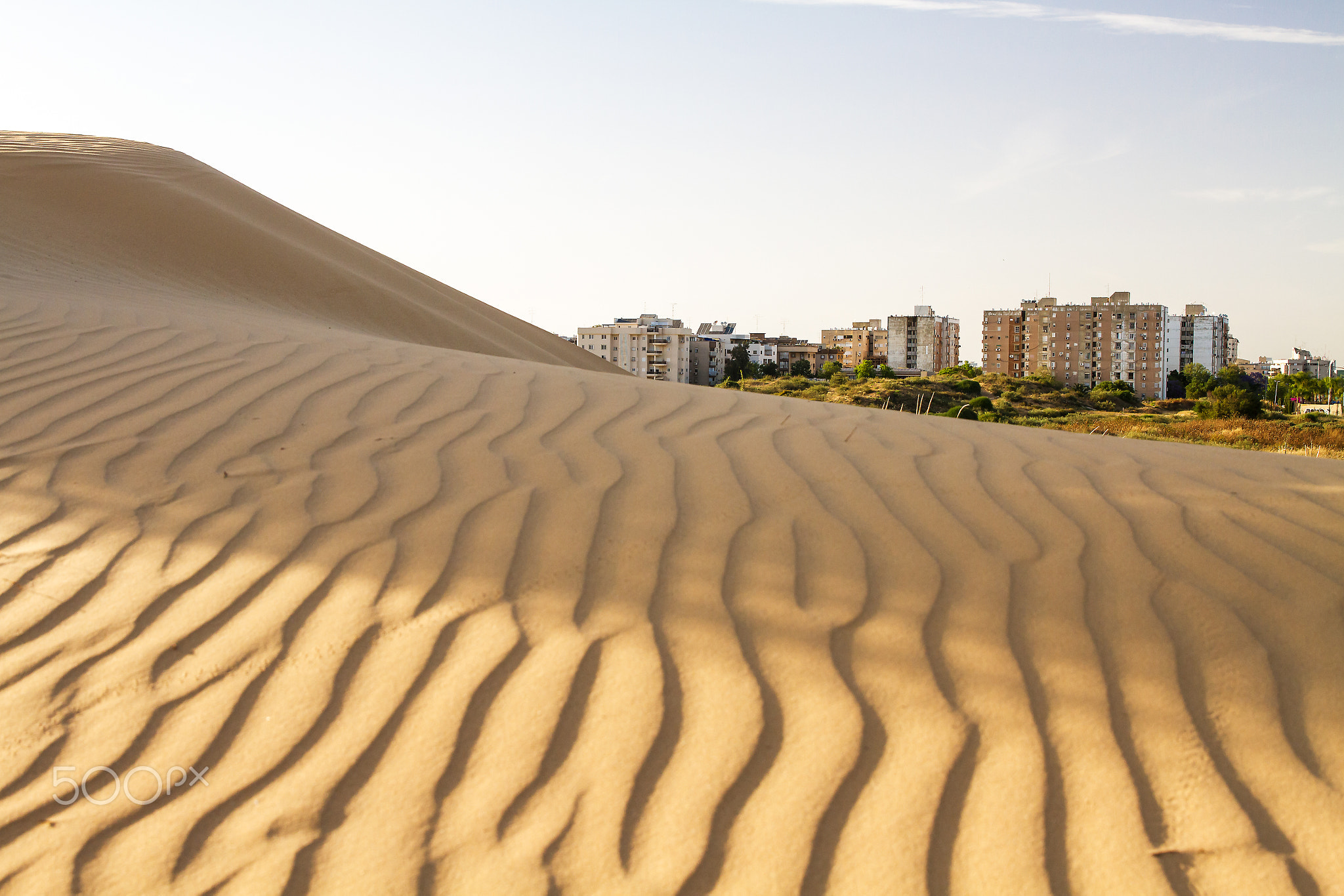 Desert and a city .