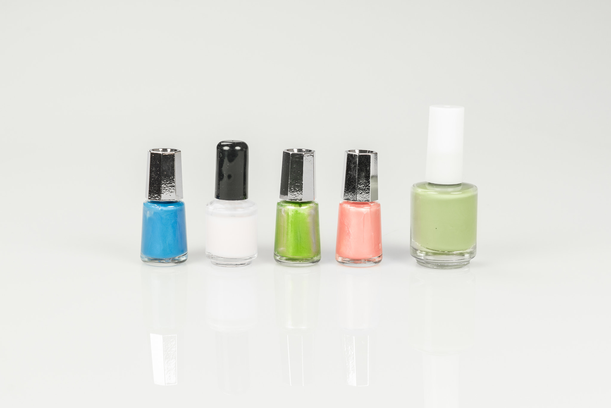 Sony a7R + Sony 50mm F1.4 sample photo. Nail polish in various colors photography