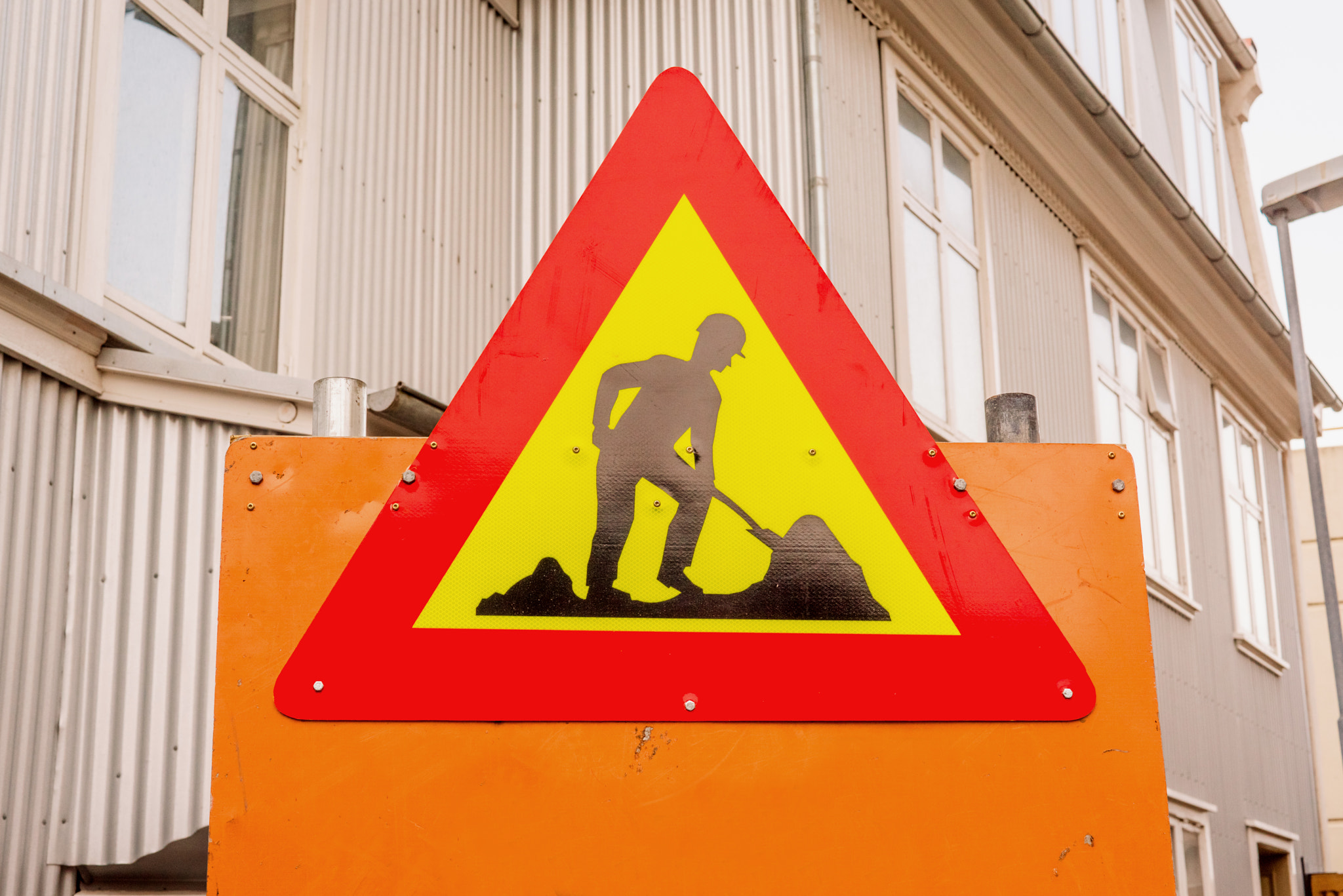 Sony a7R + Sony 50mm F1.4 sample photo. Under construction sign in a street photography