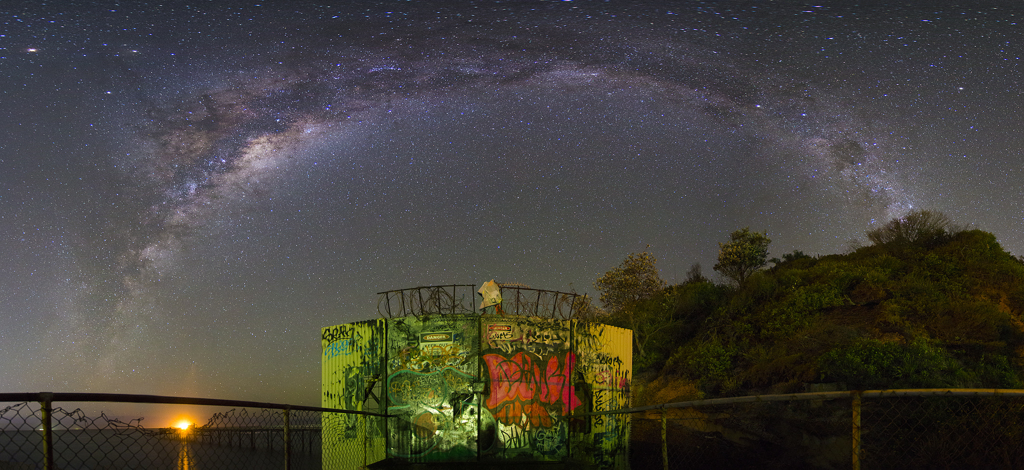 Tokina AT-X Pro 12-24mm F4 (IF) DX sample photo. Milky way over abandoned long jetty photography