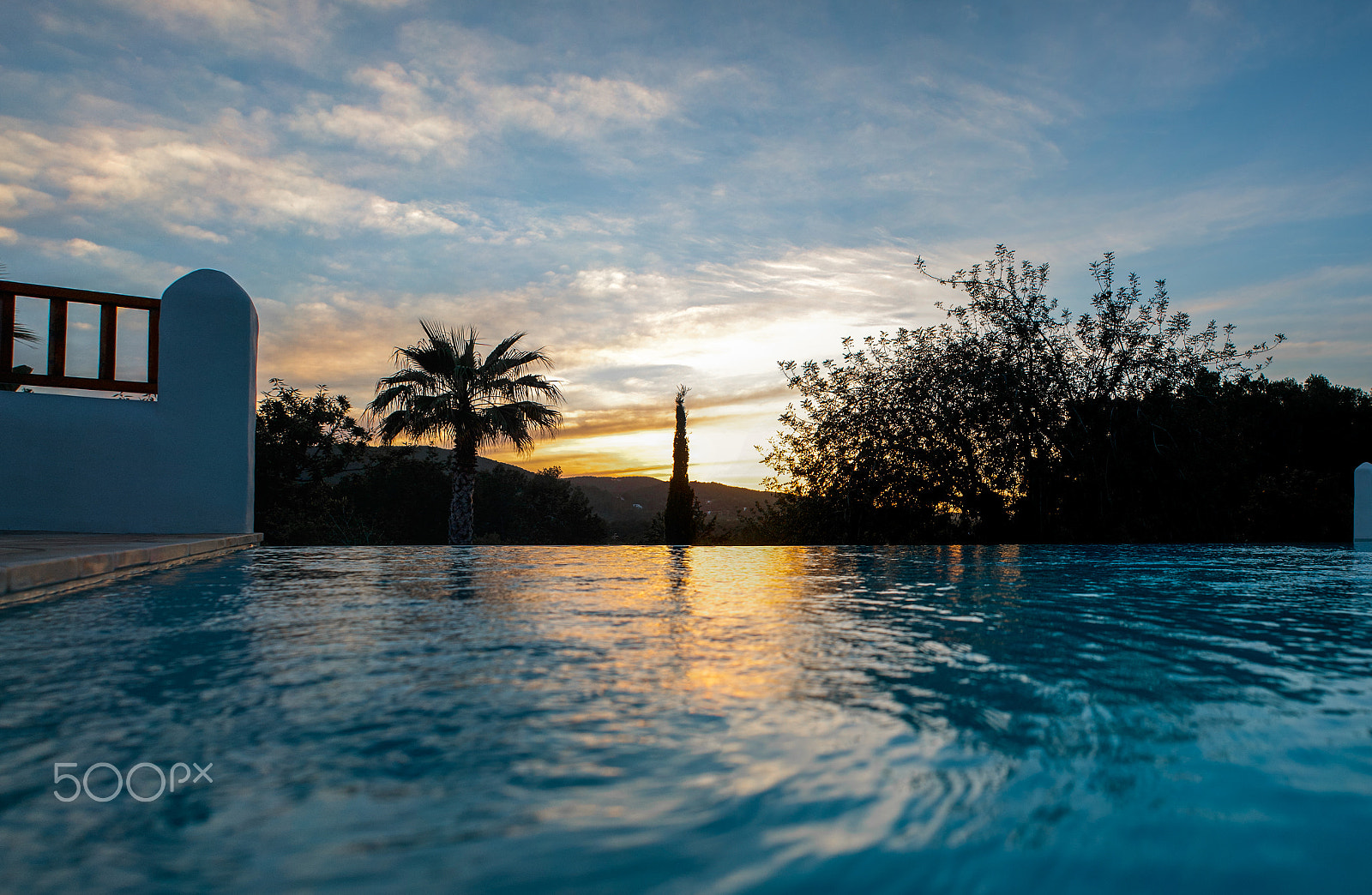 Nikon D3 + AF Nikkor 24mm f/2.8 sample photo. Ibiza sky over the pool photography