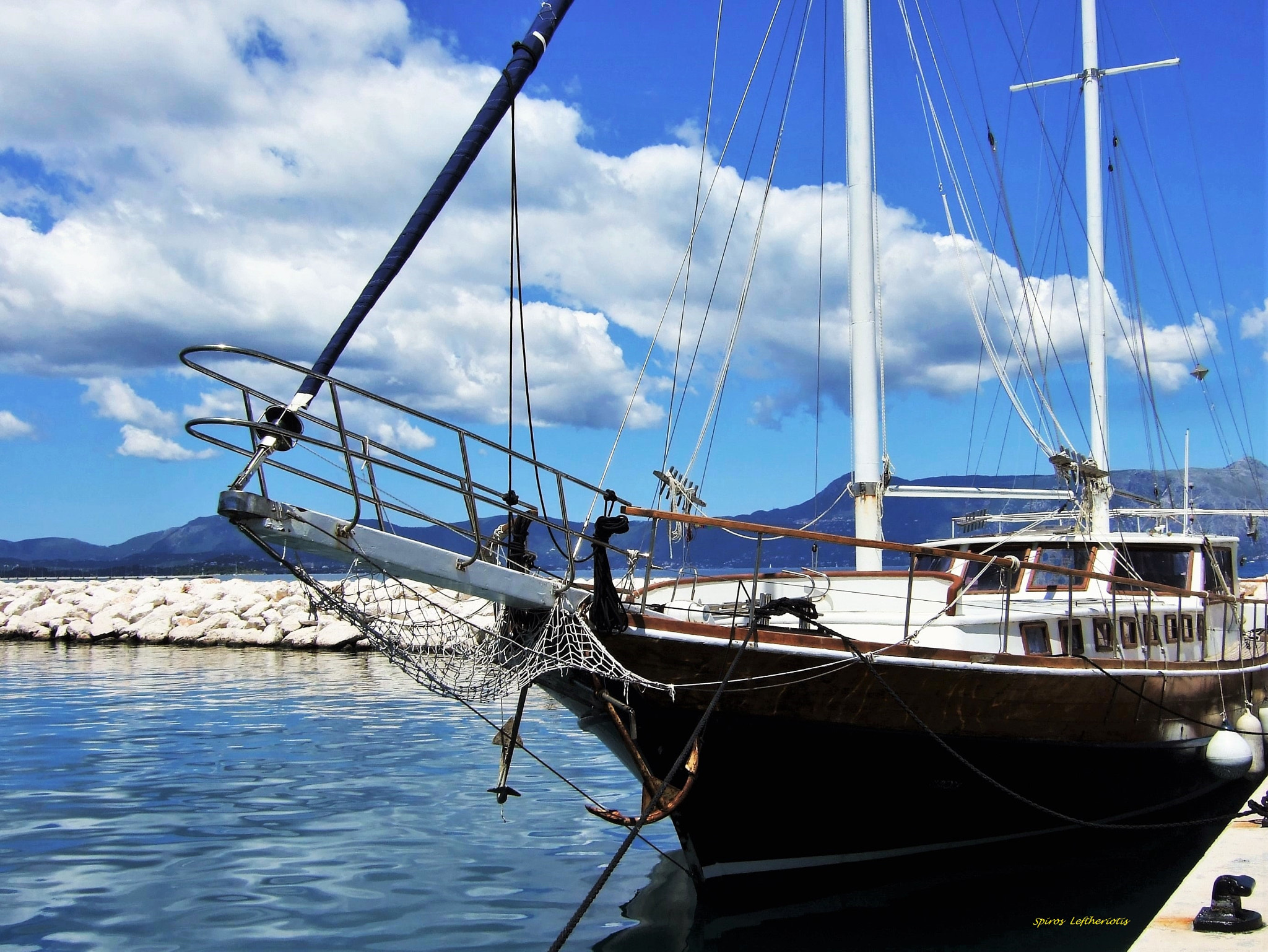 Fujifilm FinePix F31fd sample photo. The sailboat and the sky photography