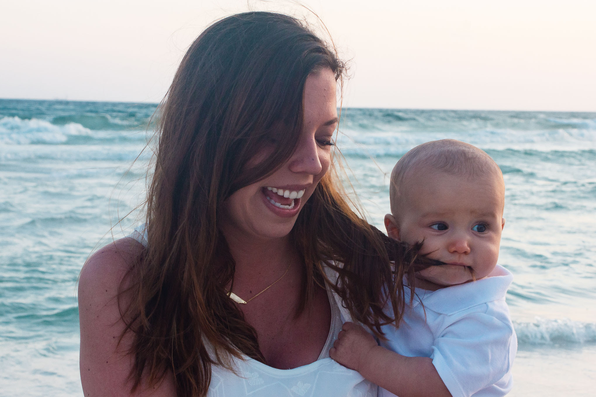 Canon EF 35-80mm f/4-5.6 sample photo. Baby eating momma's hair photography