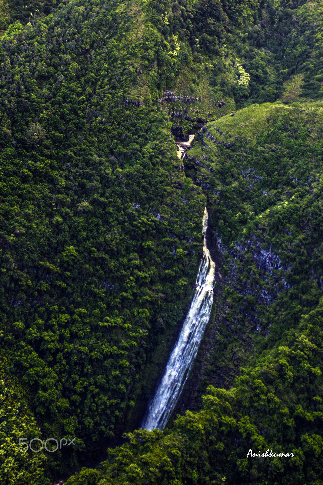 Canon EOS 600D (Rebel EOS T3i / EOS Kiss X5) + Tamron 16-300mm F3.5-6.3 Di II VC PZD Macro sample photo. Moloka'i aerial waterfall shot photography