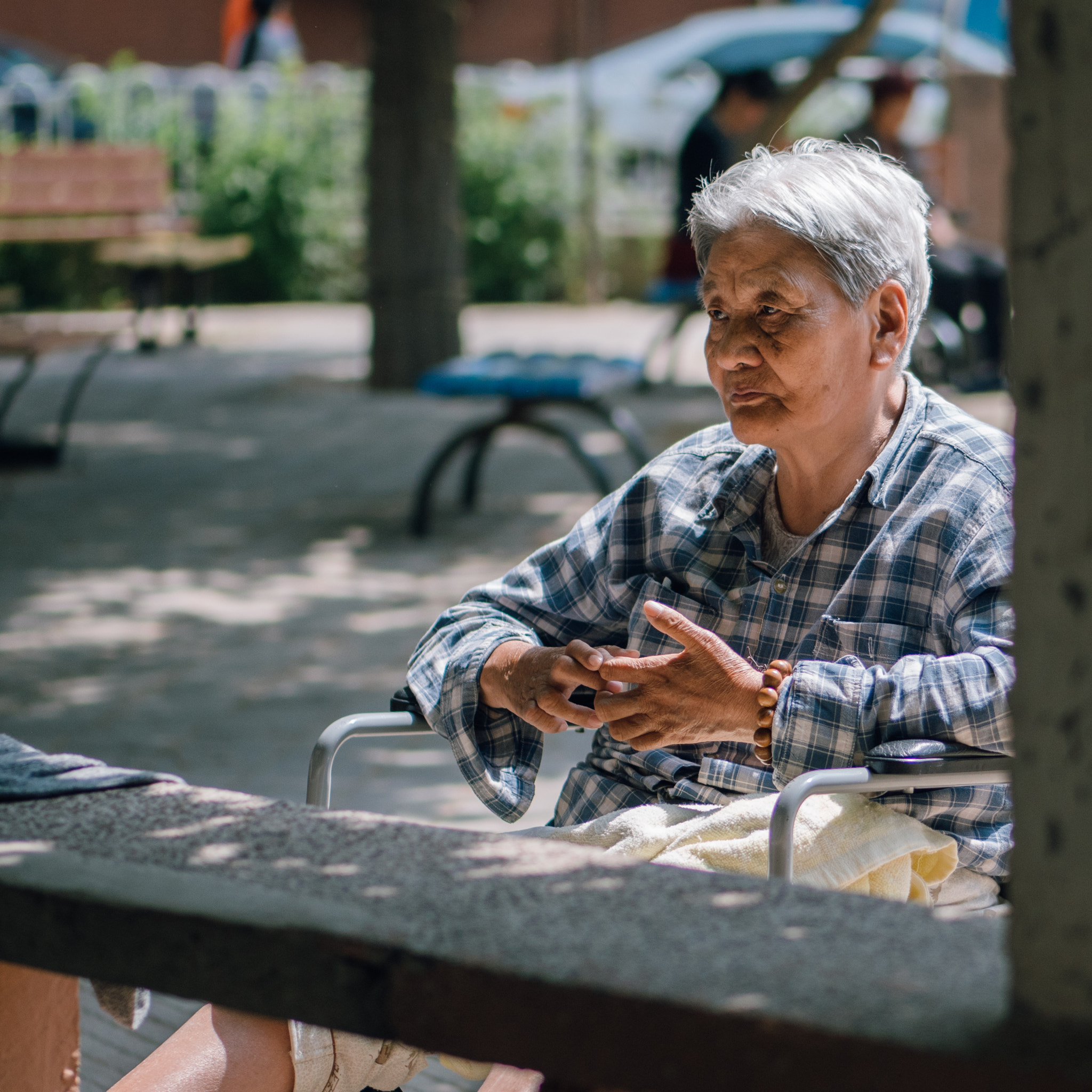 Panasonic Lumix G 42.5mm F1.7 ASPH Power OIS sample photo. Old man in may's sunlight photography