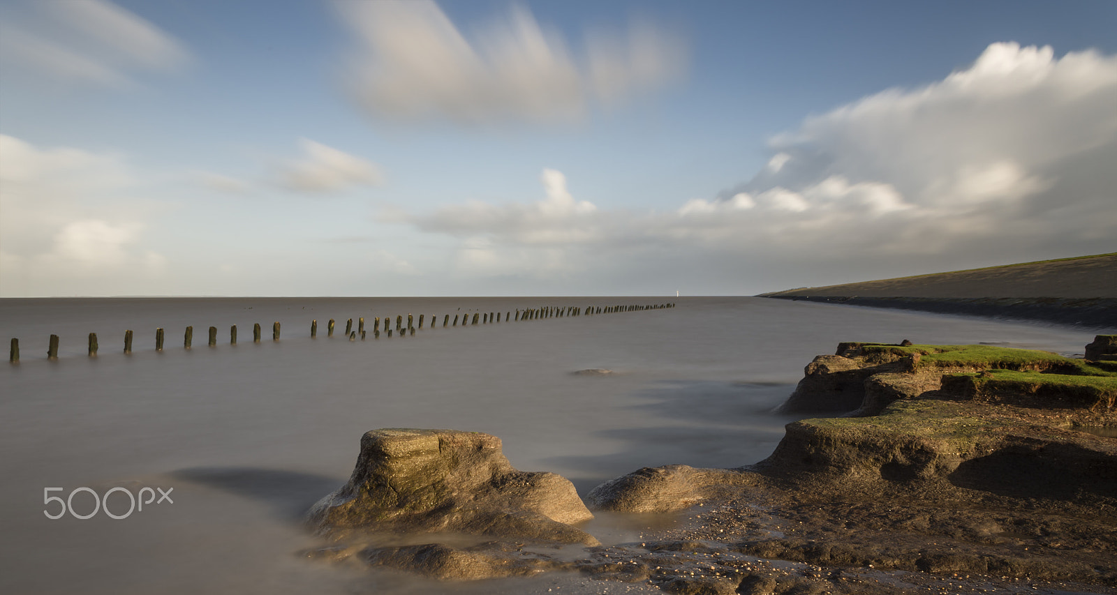 Pentax smc DA 18-55mm F3.5-5.6 ED AL II (IF) sample photo. Watching the erosion creating this mudflat scenery photography