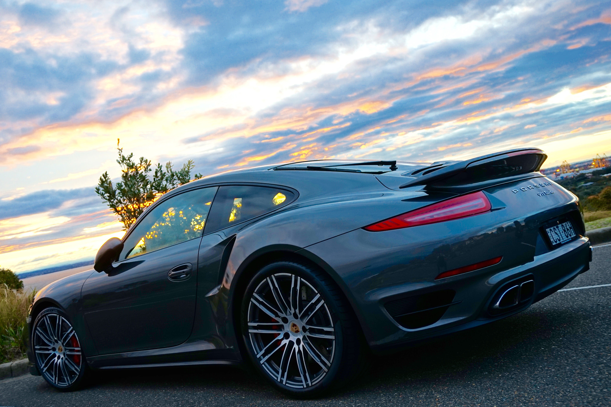 Sony Alpha QX1 + Sony E 18-50mm F4-5.6 sample photo. I love my porsche 911 turbo, it's fantastic monster photography