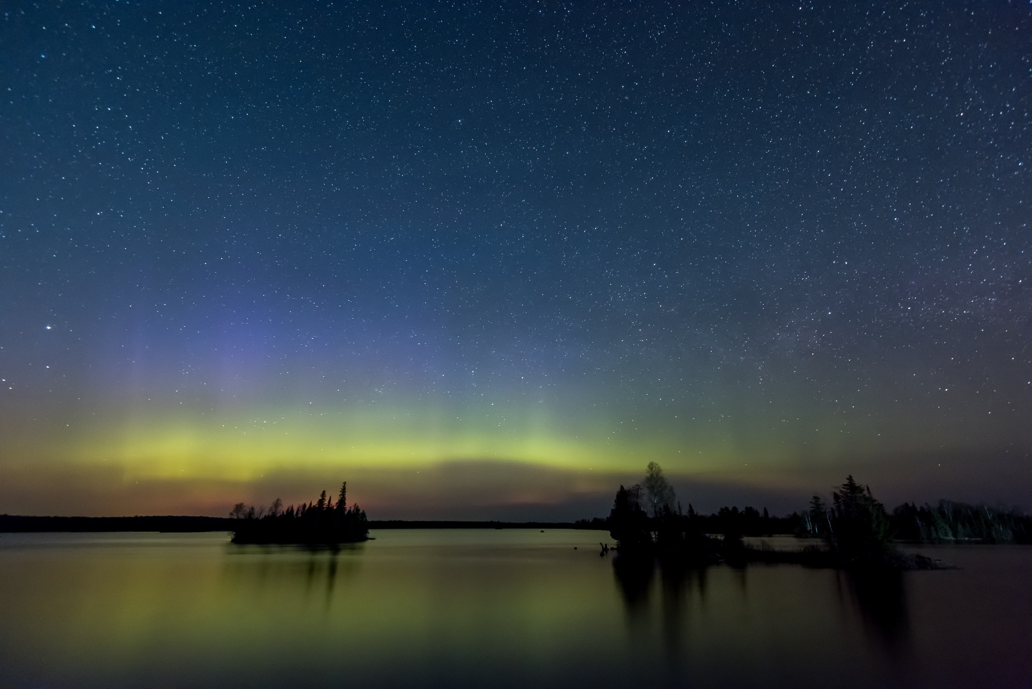 Nikon D810A + Nikon AF-S Nikkor 16-35mm F4G ED VR sample photo. Aurora reflected in boulder lake photography