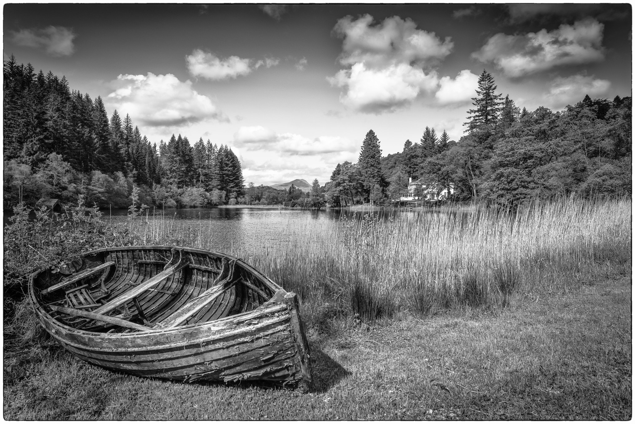 Nikon D800E + Nikon AF Nikkor 20mm F2.8D sample photo. Boat on the loch photography