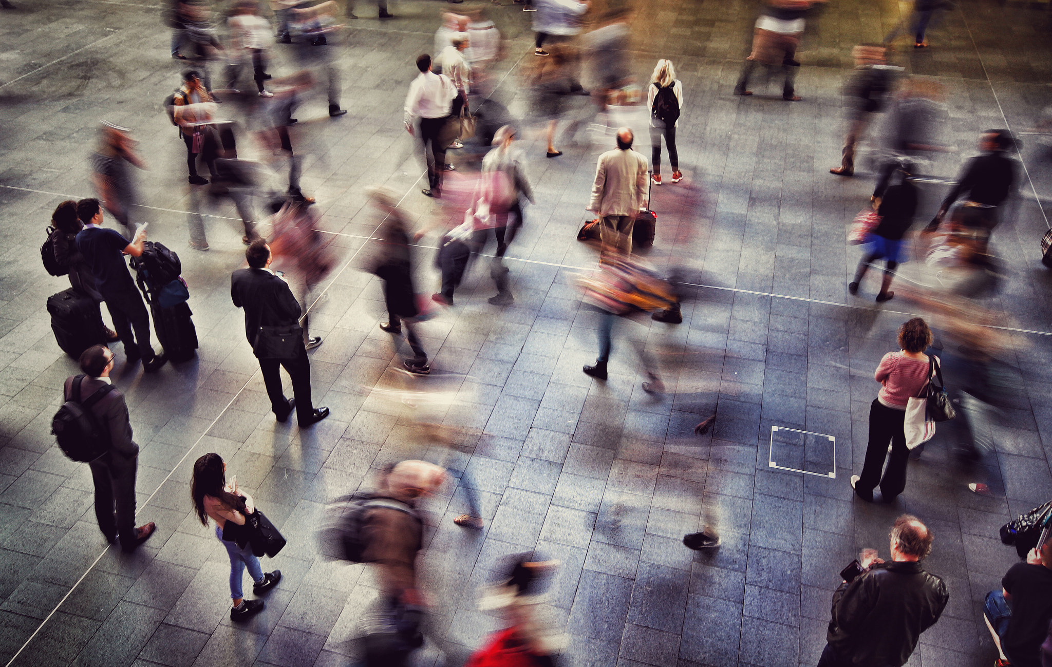 Canon 10-20mm sample photo. A crowded train station with passengers and commut ... photography