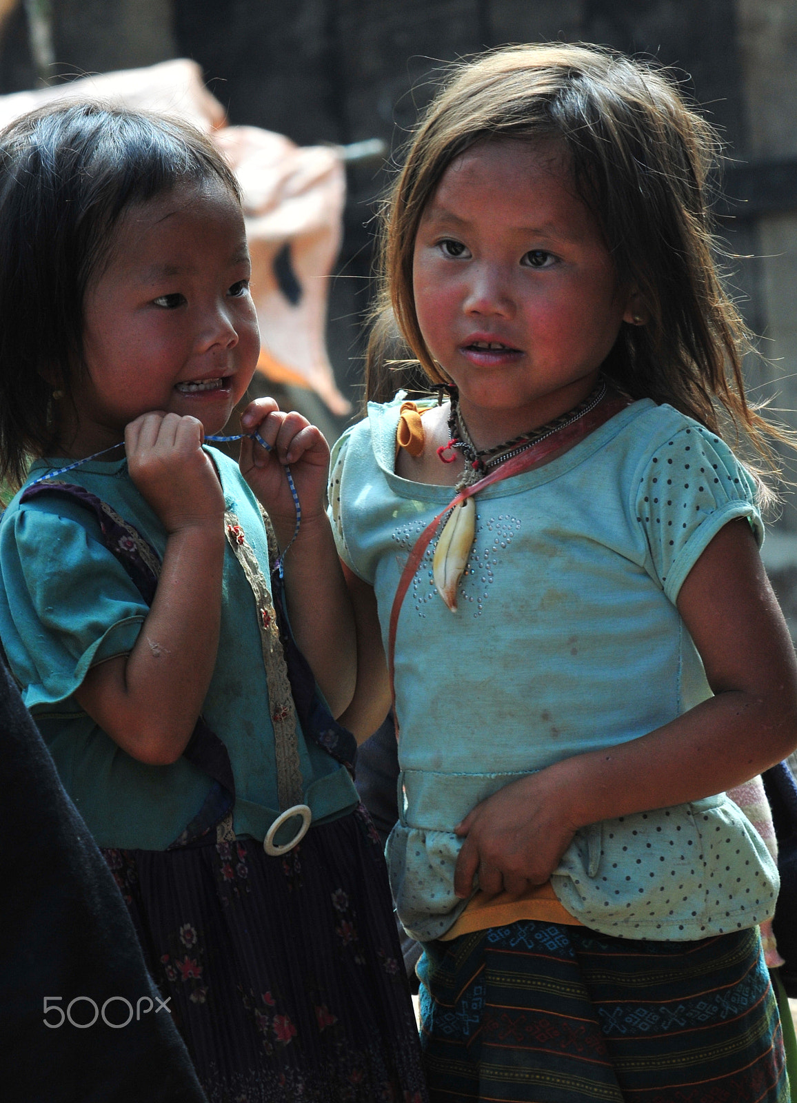 Nikon D300S sample photo. Wearing tiger teeth to ward of bad luck even among the very young () photography