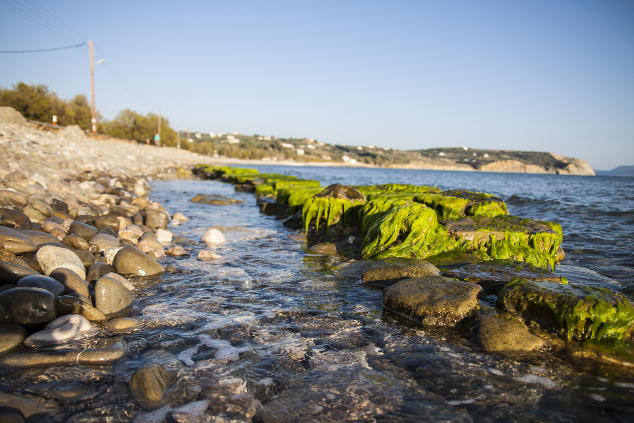 Sigma 17-70mm F2.8-4 DC Macro OS HSM sample photo. Sea with a green stripe photography