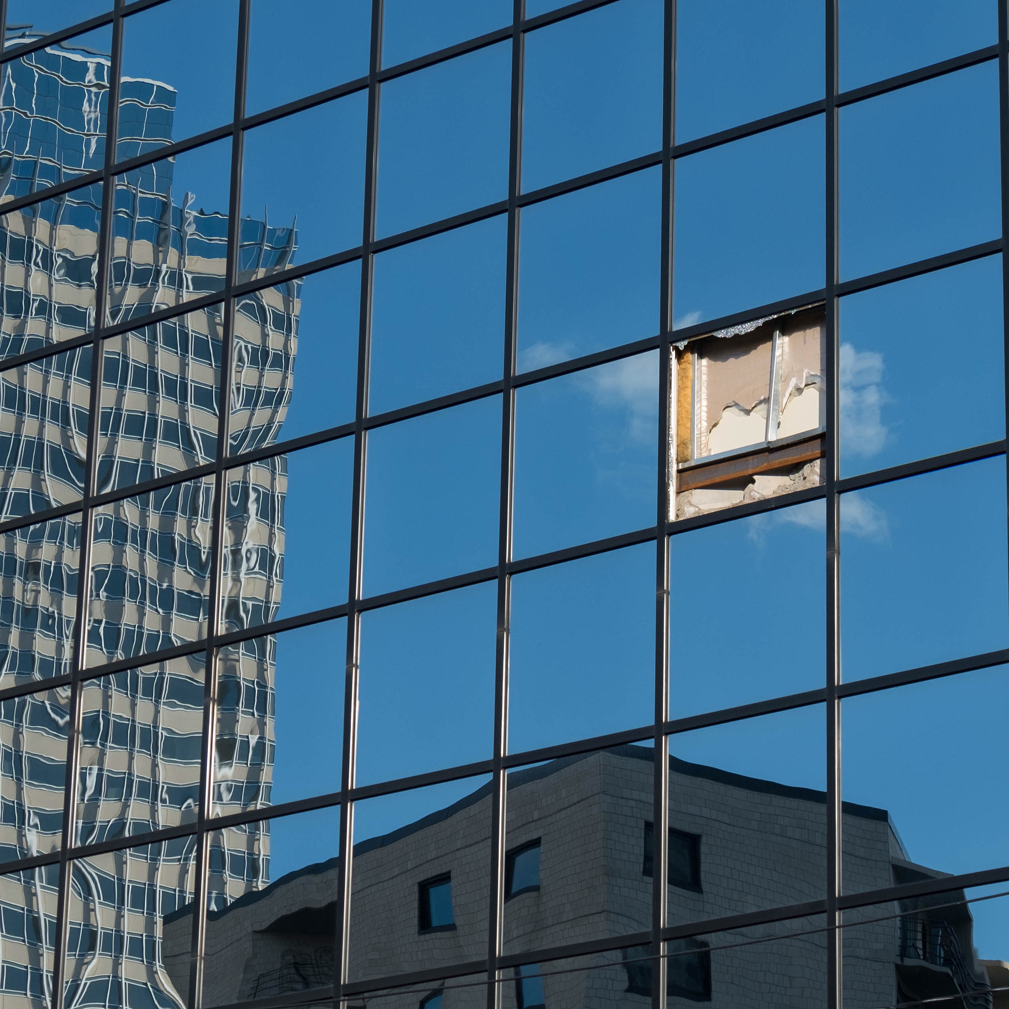 Fujifilm X-E1 + Fujifilm XF 18-135mm F3.5-5.6 R LM OIS WR sample photo. Broken window photography