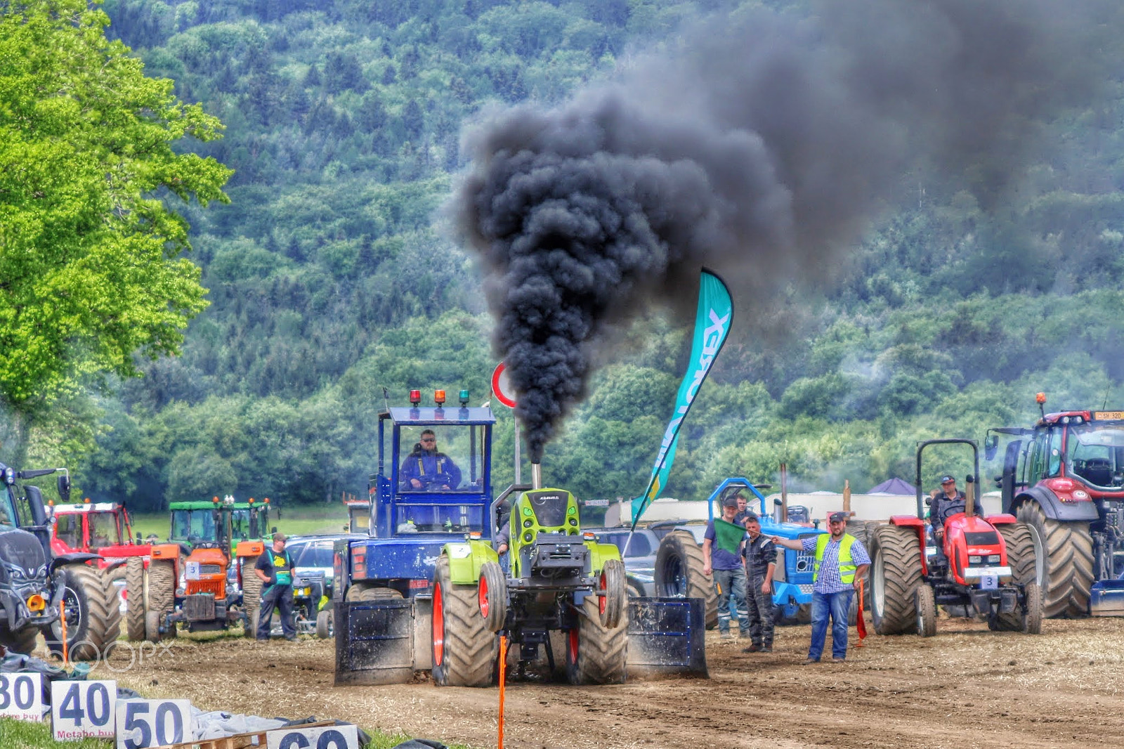 Canon EOS 7D Mark II + Canon EF 28-135mm F3.5-5.6 IS USM sample photo. Tractor pulling competition 300 feets by willie b photography