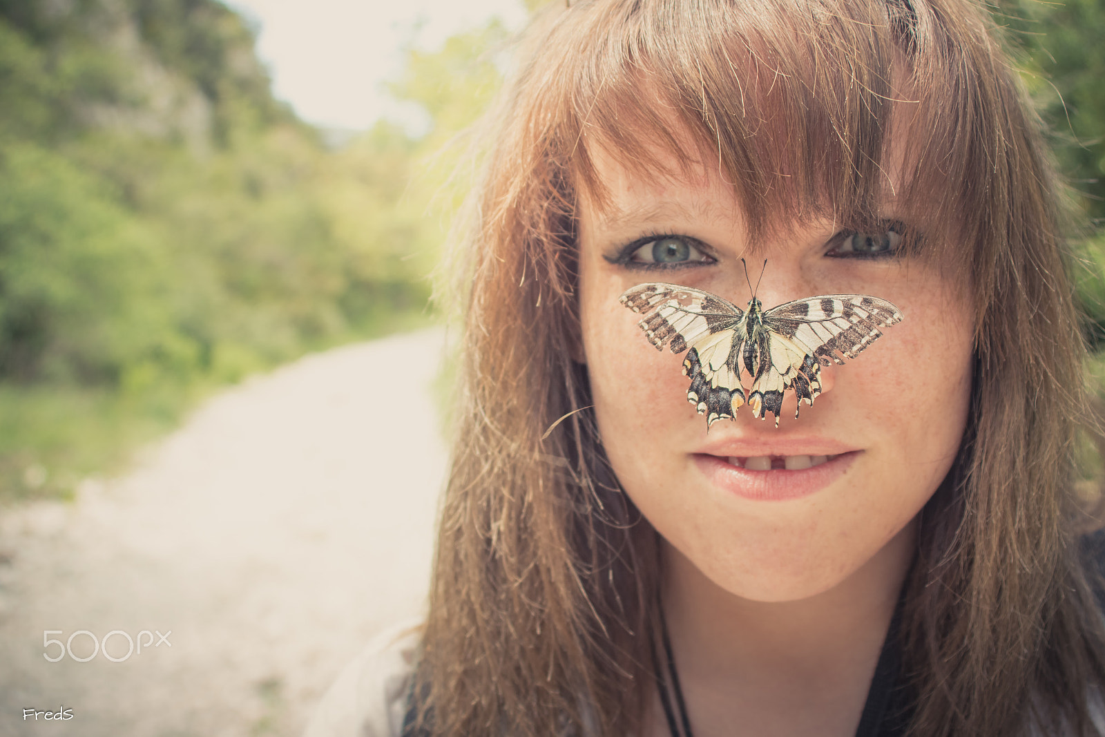 Canon EF 28-80mm f/3.5-5.6 sample photo. The butterfly and the redhead photography