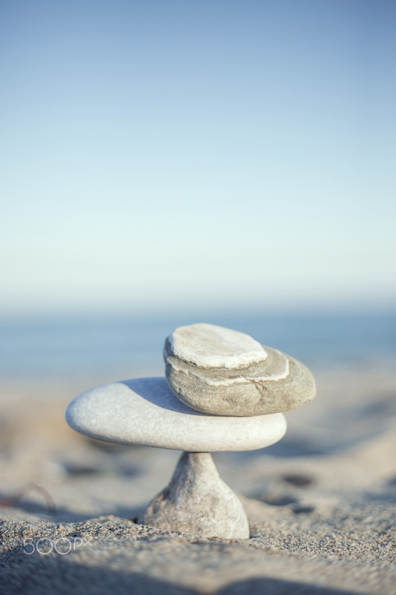 Balance pebbles on the beach