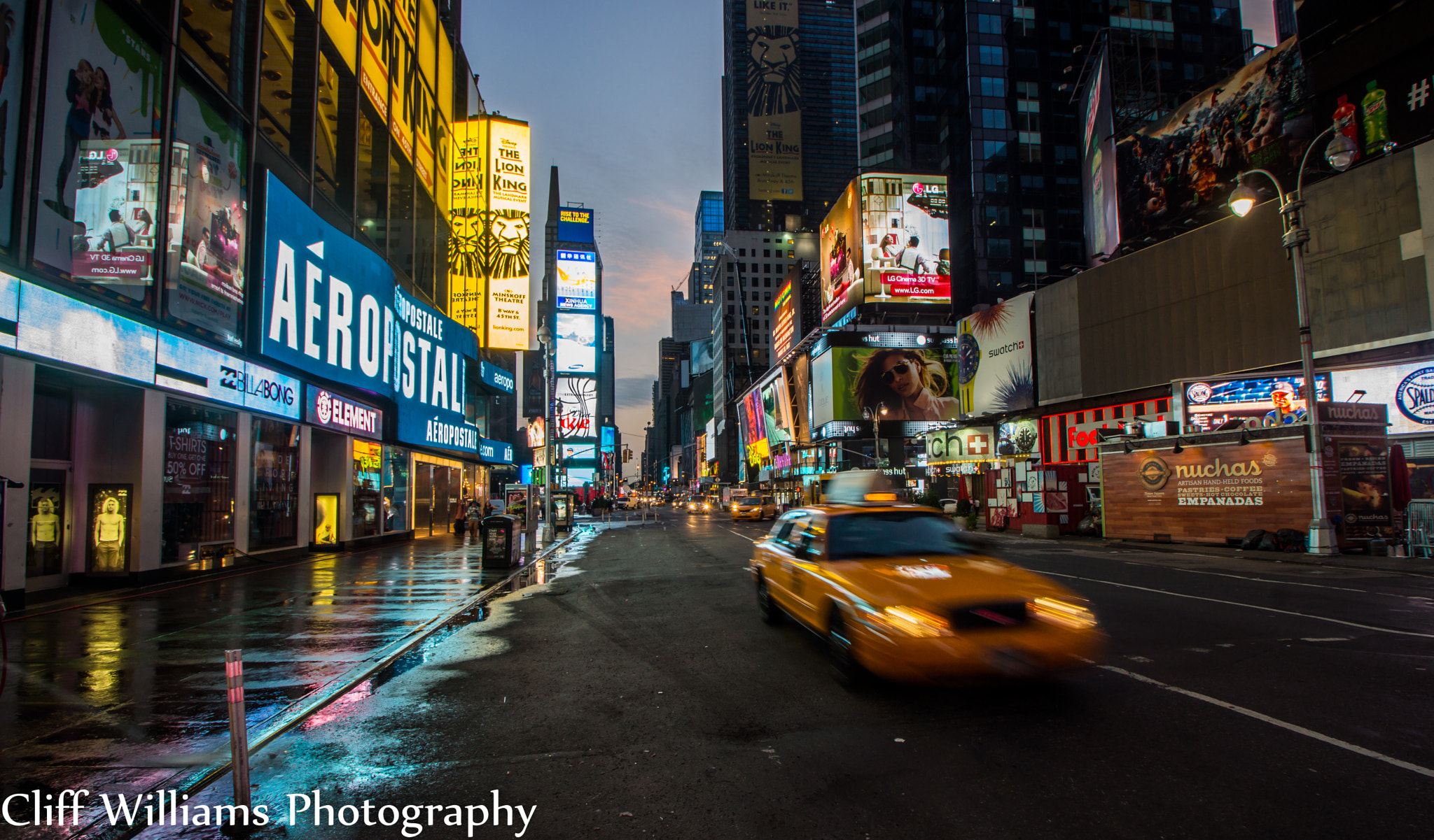 Sony SLT-A65 (SLT-A65V) sample photo. Yellow cab in times square photography