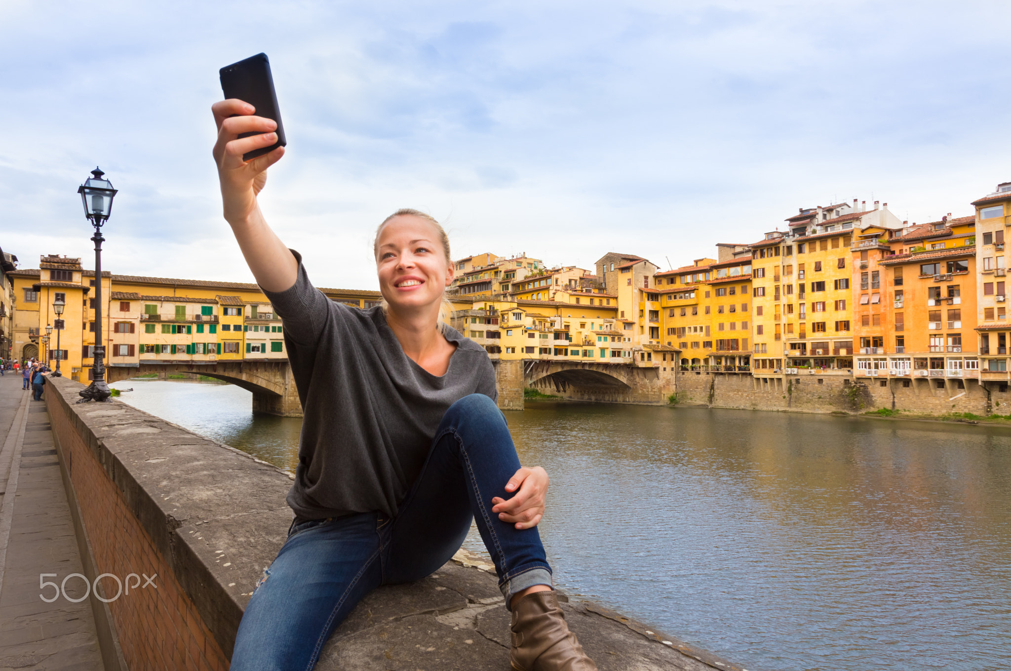 Lady taking selfie in Florence.