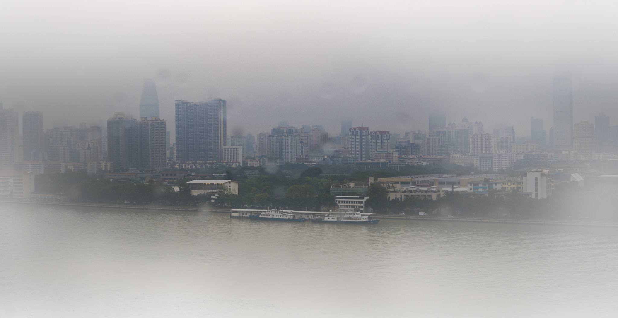 Olympus OM-D E-M5 sample photo. City in fog iii photography