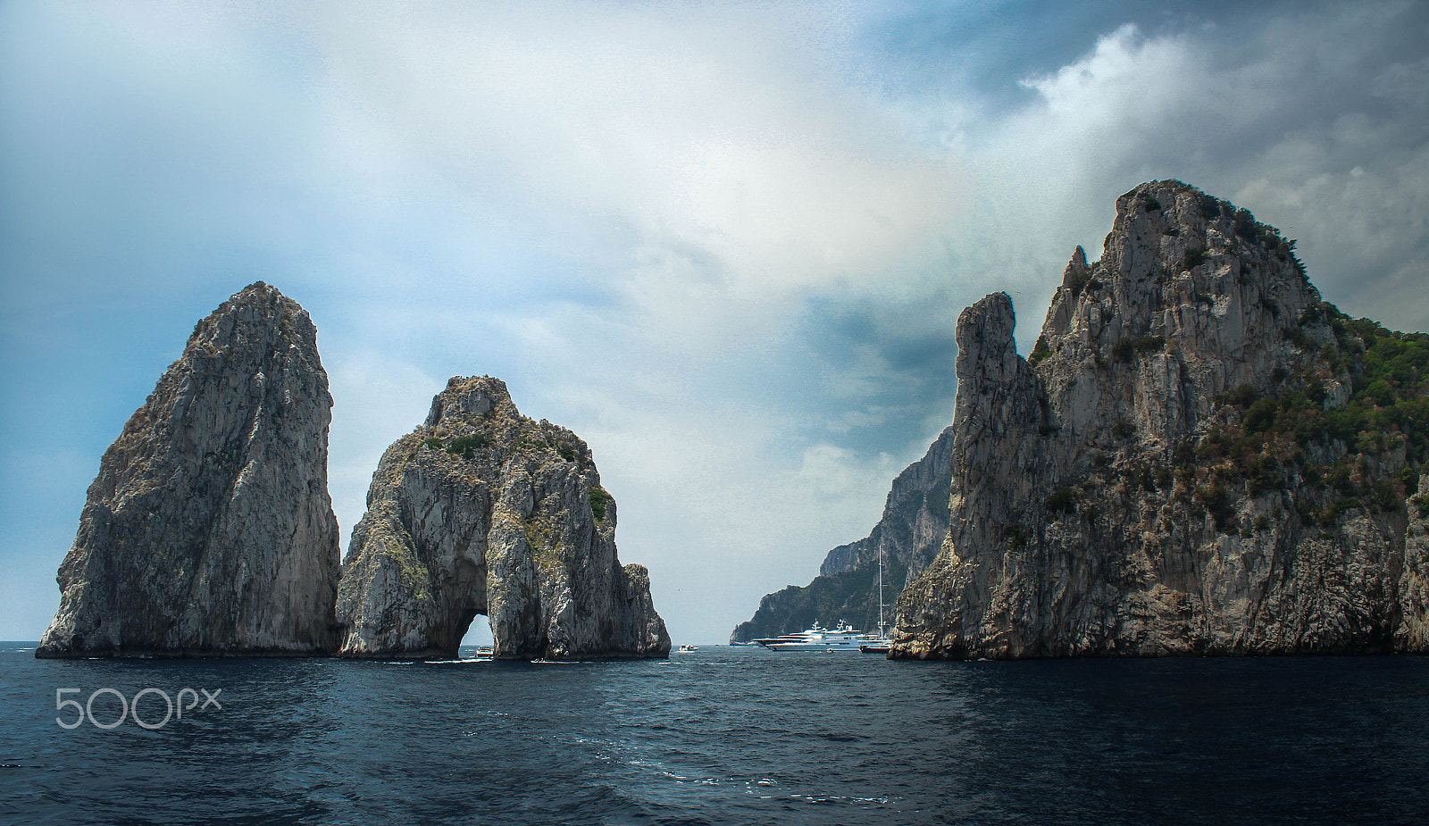 Canon EOS 100D (EOS Rebel SL1 / EOS Kiss X7) sample photo. I faraglioni di capri, by mauricio barbiani photography