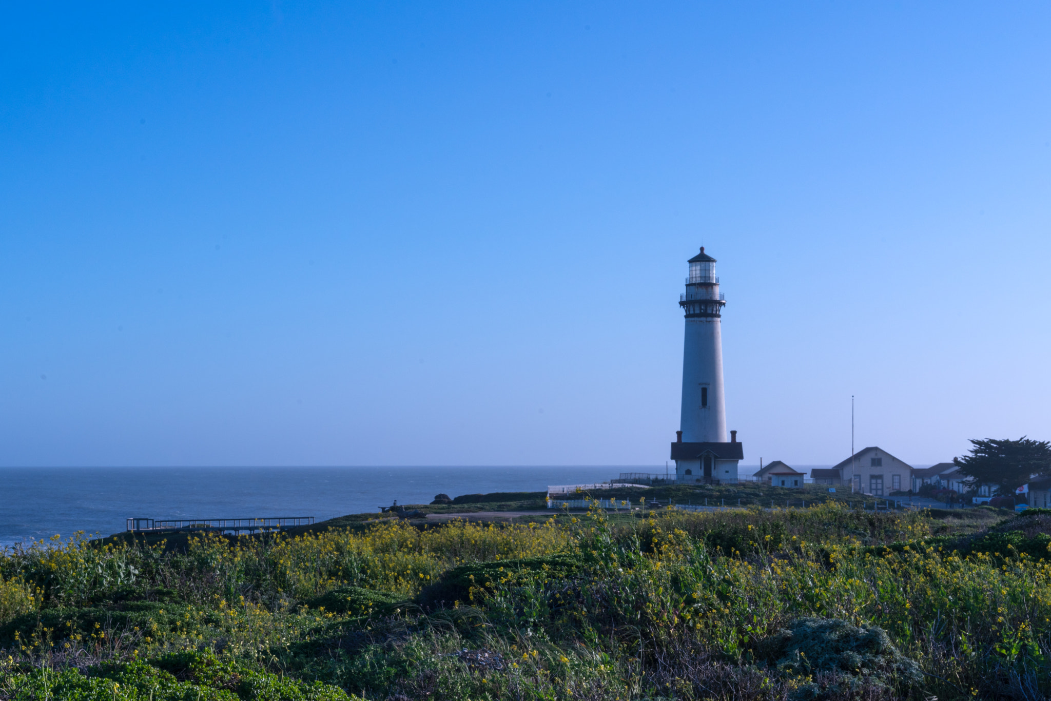 E 50mm F2 sample photo. Lighthouse on the sea photography