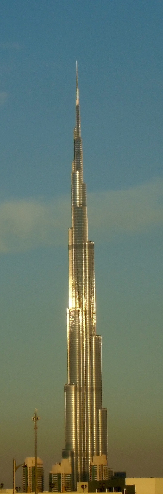CASIO EX-ZS100 sample photo. Glowing with pride reflecting the sunset photography