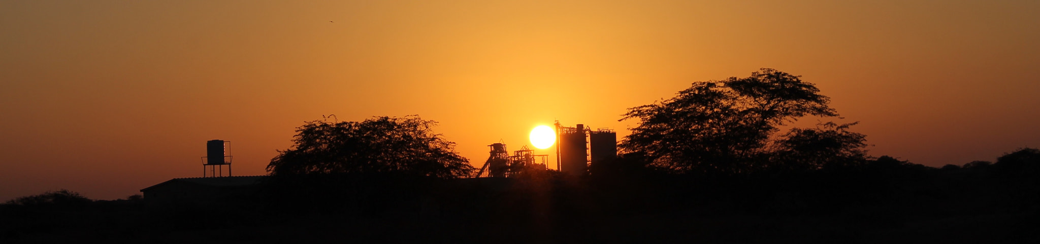 Canon EF-S 18-55mm F3.5-5.6 III sample photo. Industrial sunset photography