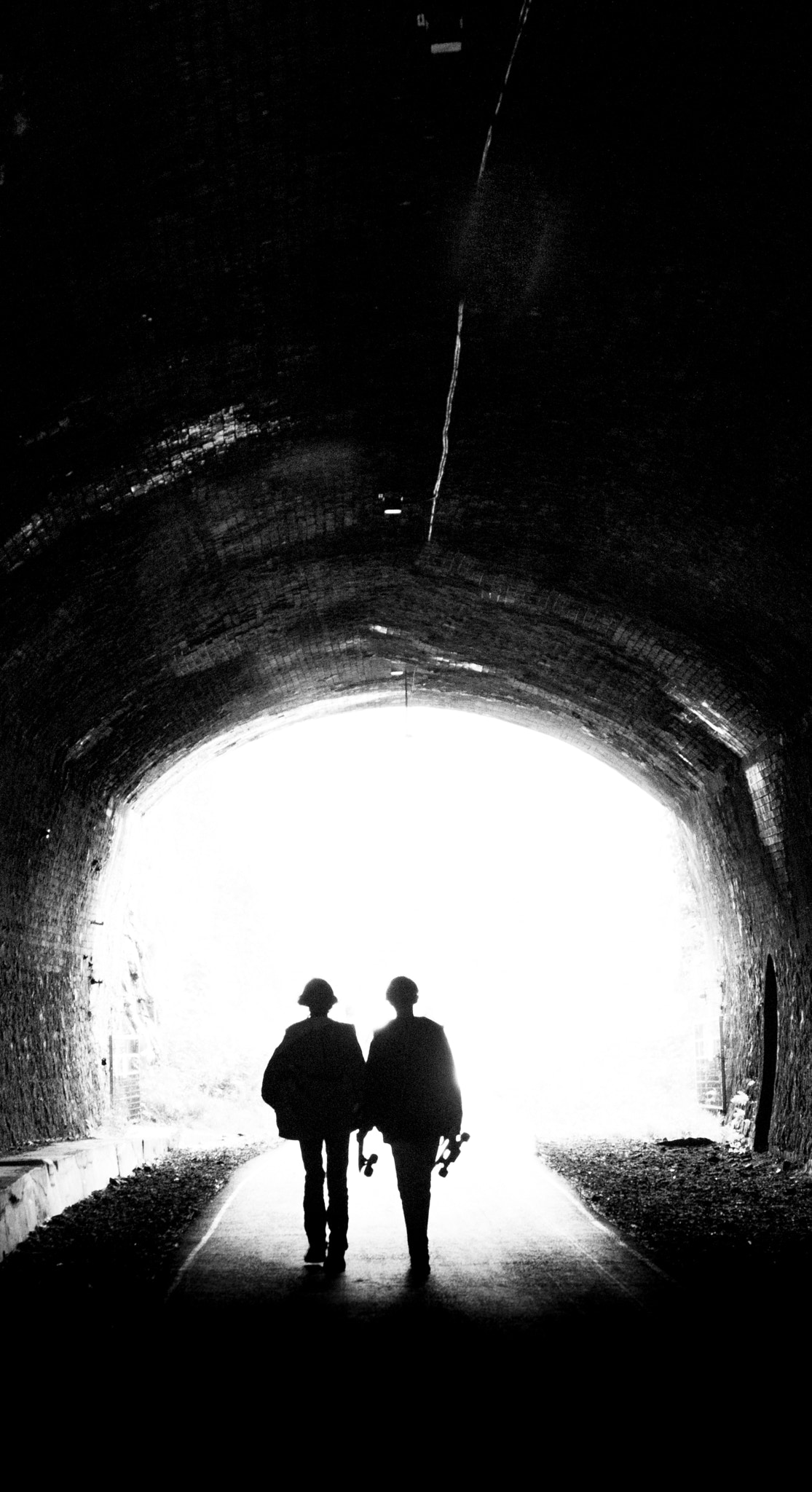 Canon EOS 700D (EOS Rebel T5i / EOS Kiss X7i) + Canon EF 16-35mm F4L IS USM sample photo. Tunnel skaters photography