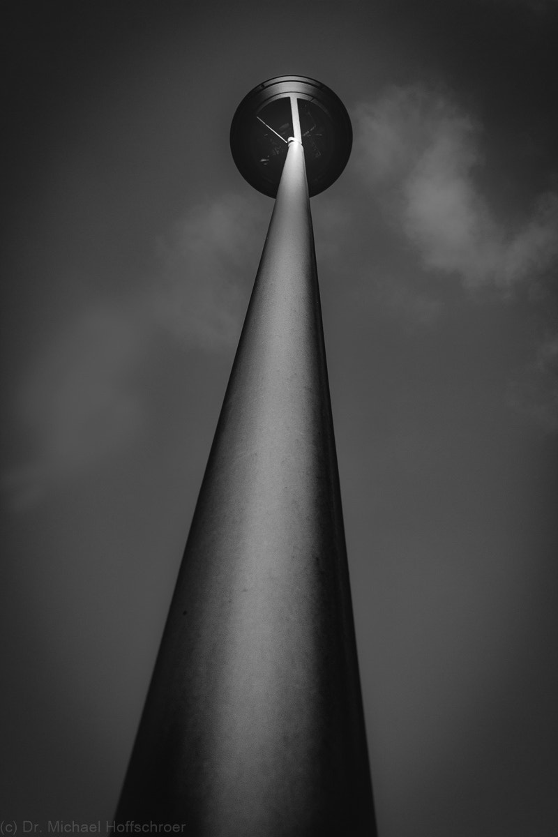 Canon EF-S 18-55mm F3.5-5.6 sample photo. Low perspectiv of a street light against the sky photography