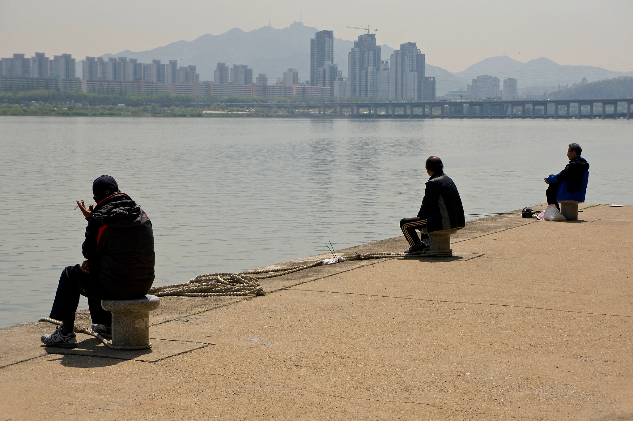 Sony E 18-55mm F3.5-5.6 OSS sample photo. Three men photography