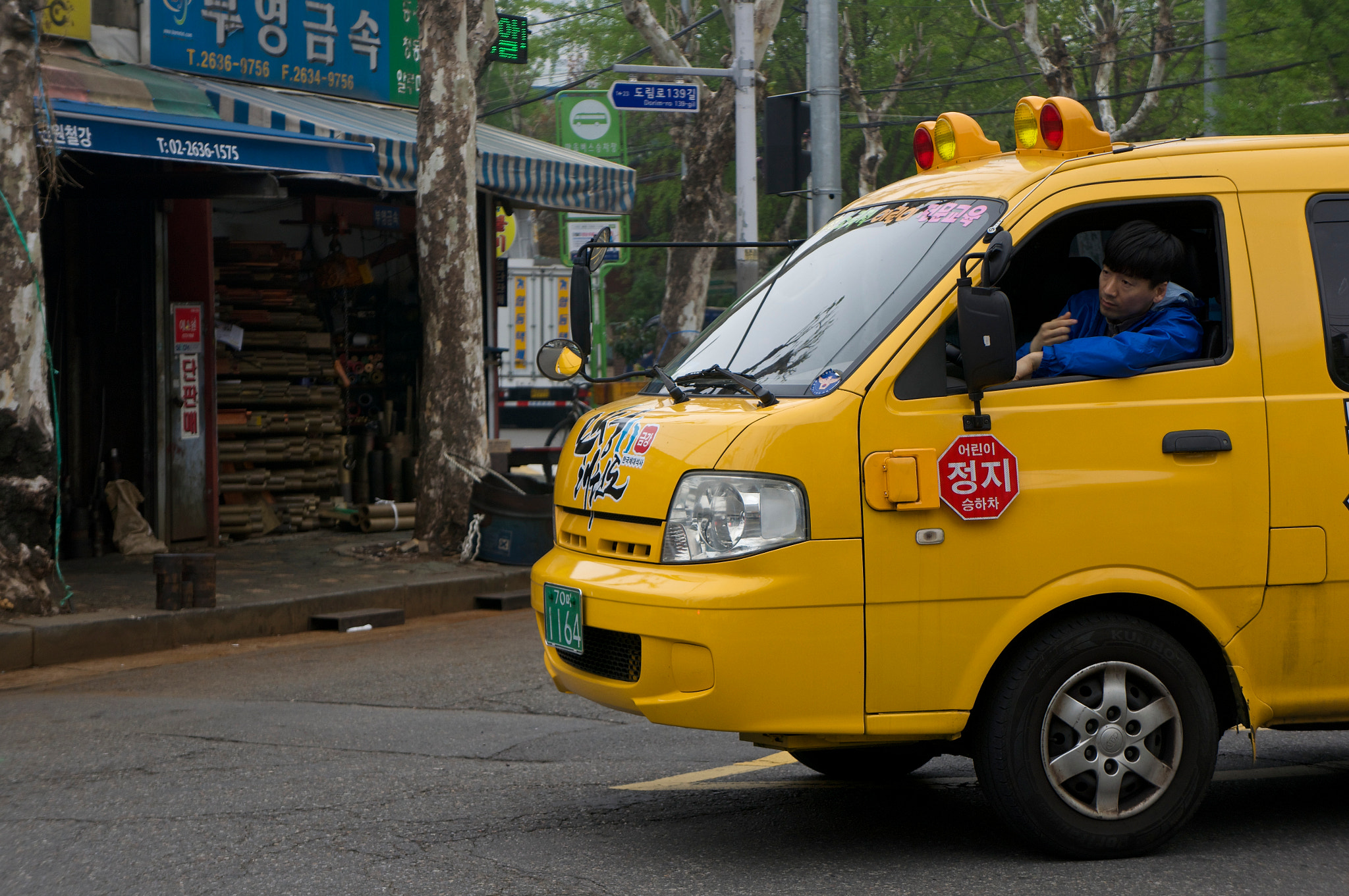 Sony E 18-55mm F3.5-5.6 OSS sample photo. School bus photography