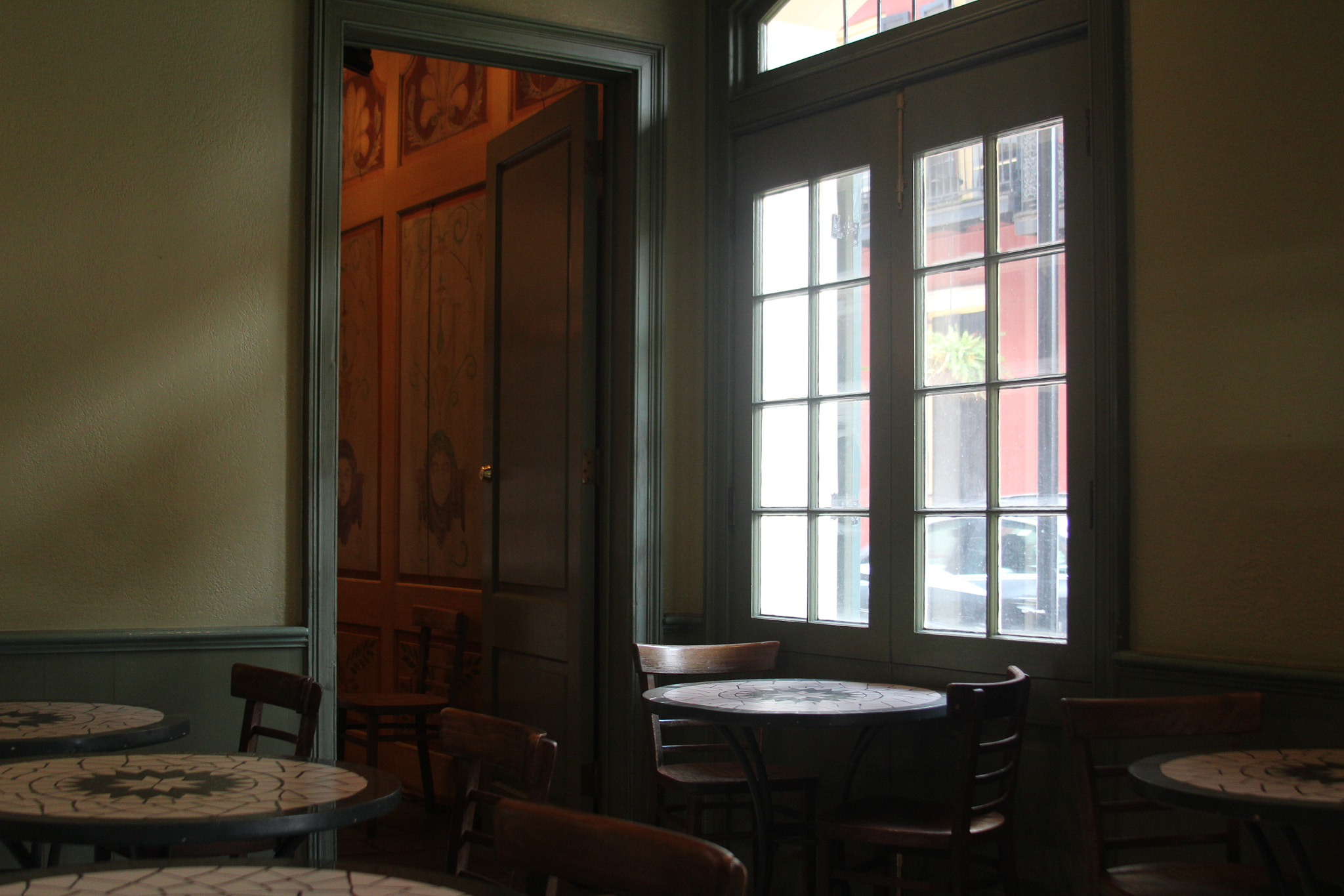 Canon EF 28-135mm F3.5-5.6 IS USM sample photo. The light from the window of the restaurant from hotel st. marie in new orleans,louisiana. nola1 photography